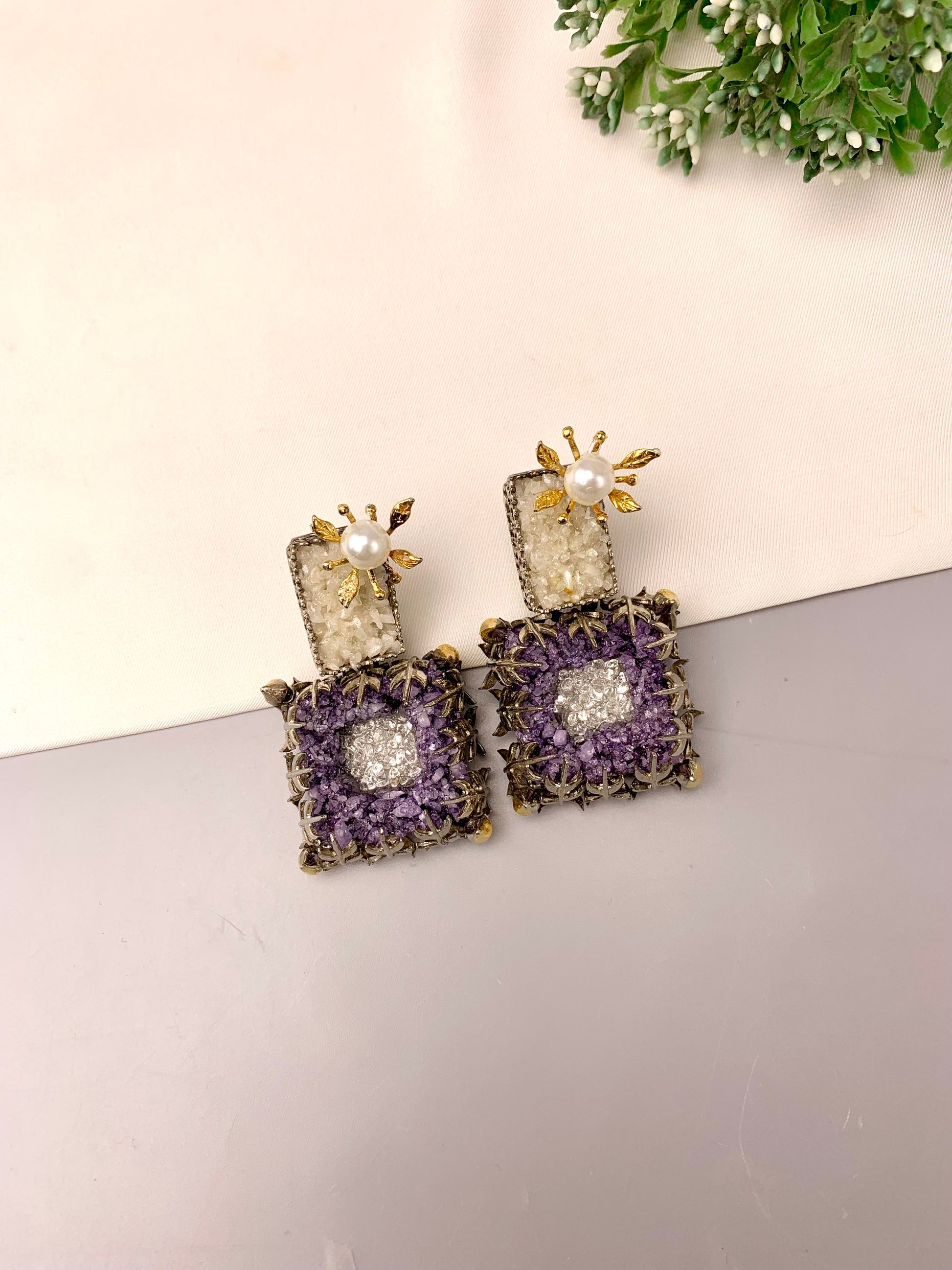 Yorkabel handcrafted earrings with American Diamonds and semi-precious natural gemstones, available in 22kt gold plated Ruby and rhodium oxidized Amethyst variants
