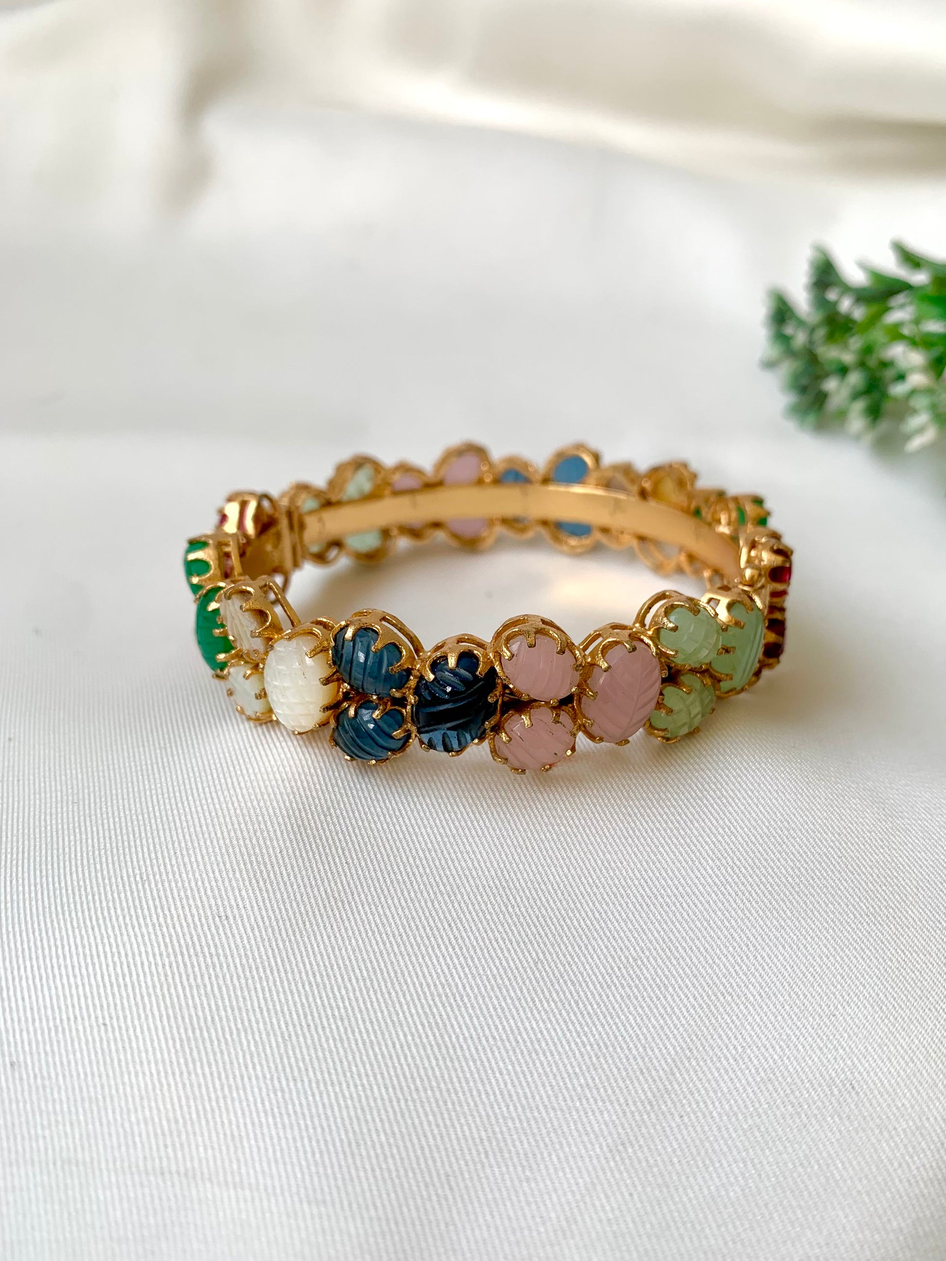 Handcrafted Ameira Bangle in 22kt gold plating with carved Mother of Pearl, Ruby, Emerald, Sapphire & Onyx stones — openable screw bangle by Zamal Jewels.