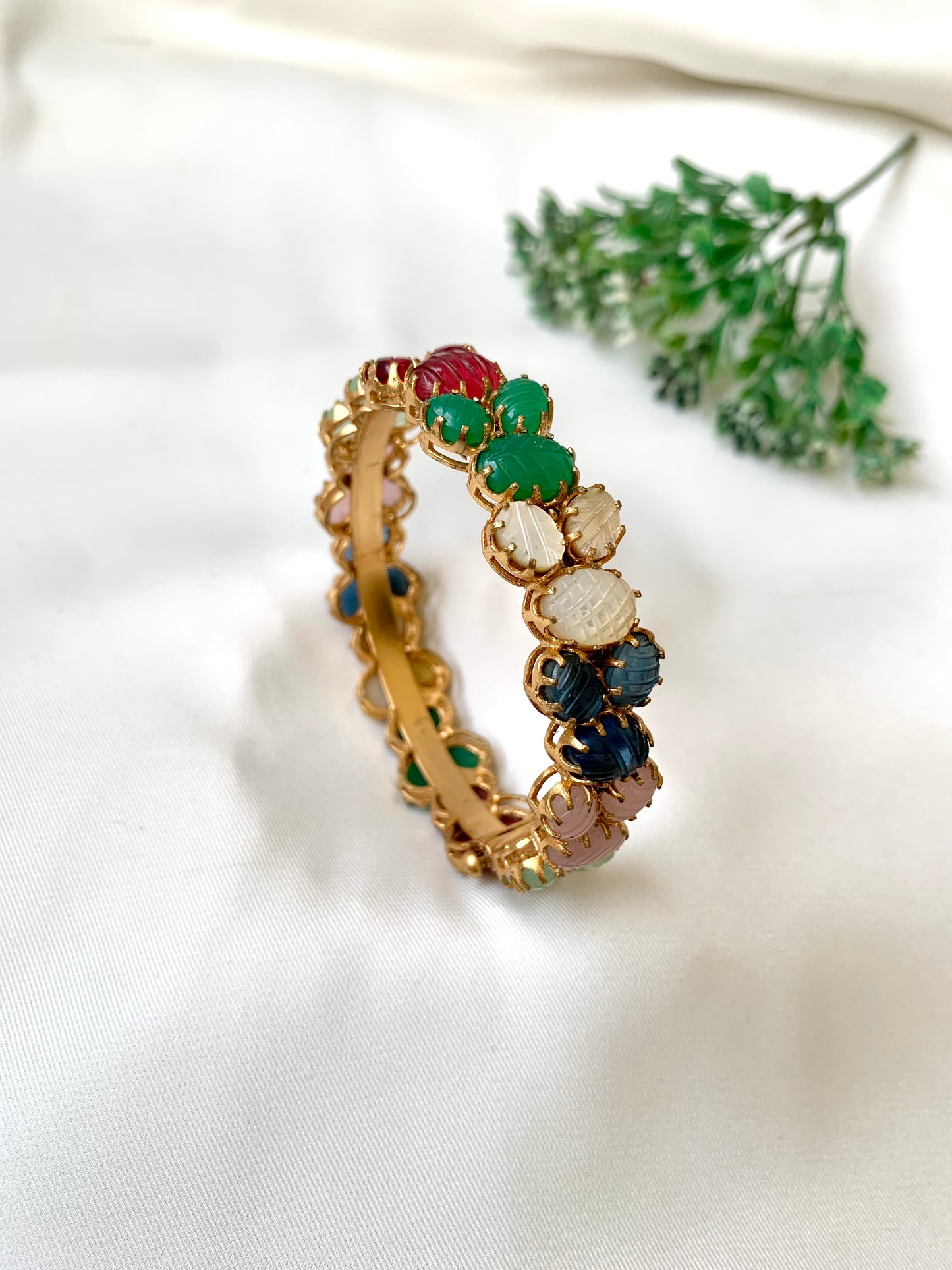Handcrafted Ameira Bangle in 22kt gold plating with carved Mother of Pearl, Ruby, Emerald, Sapphire & Onyx stones — openable screw bangle by Zamal Jewels.
