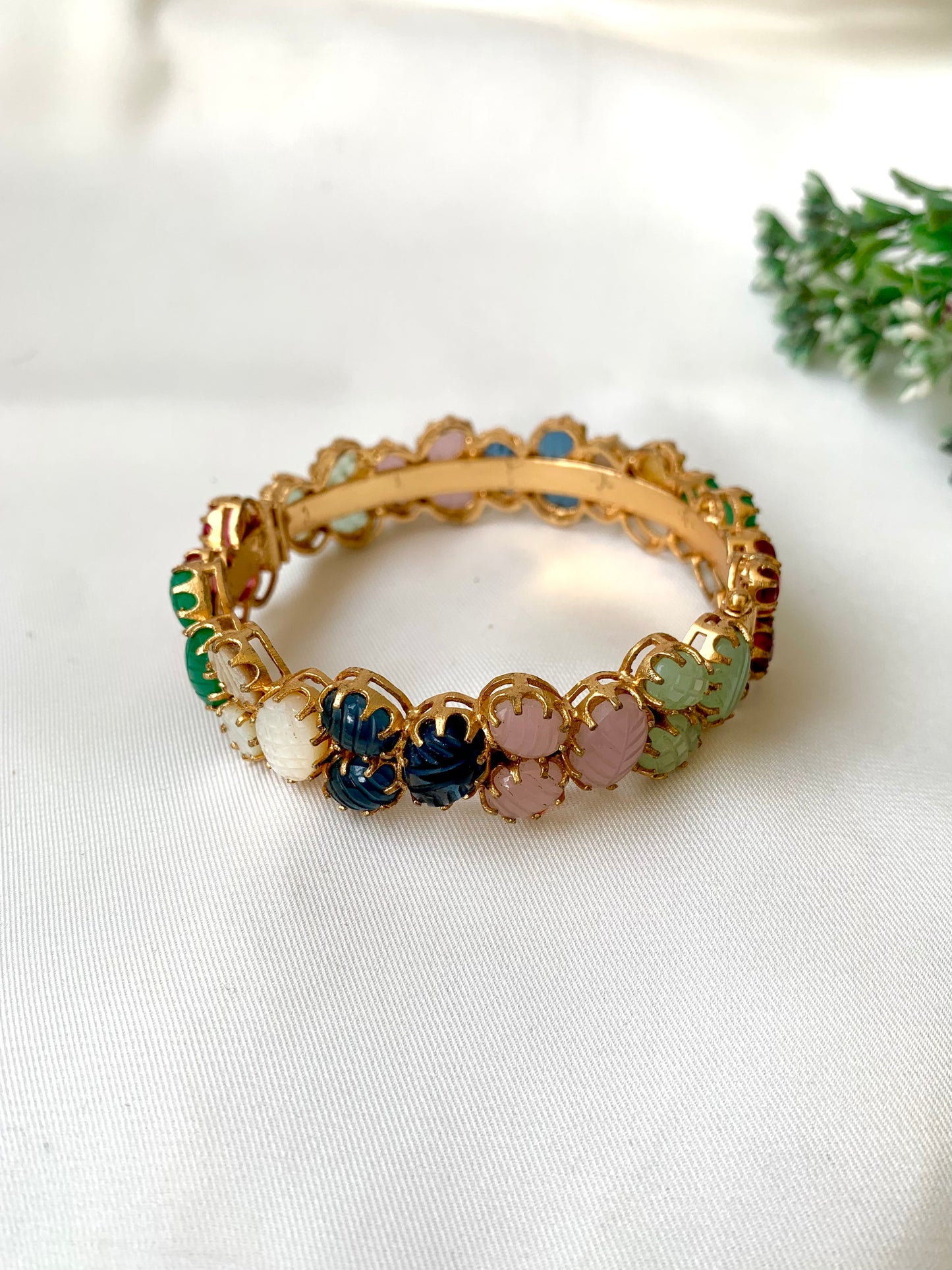Handcrafted Ameira Bangle in 22kt gold plating with carved Mother of Pearl, Ruby, Emerald, Sapphire & Onyx stones — openable screw bangle by Zamal Jewels.