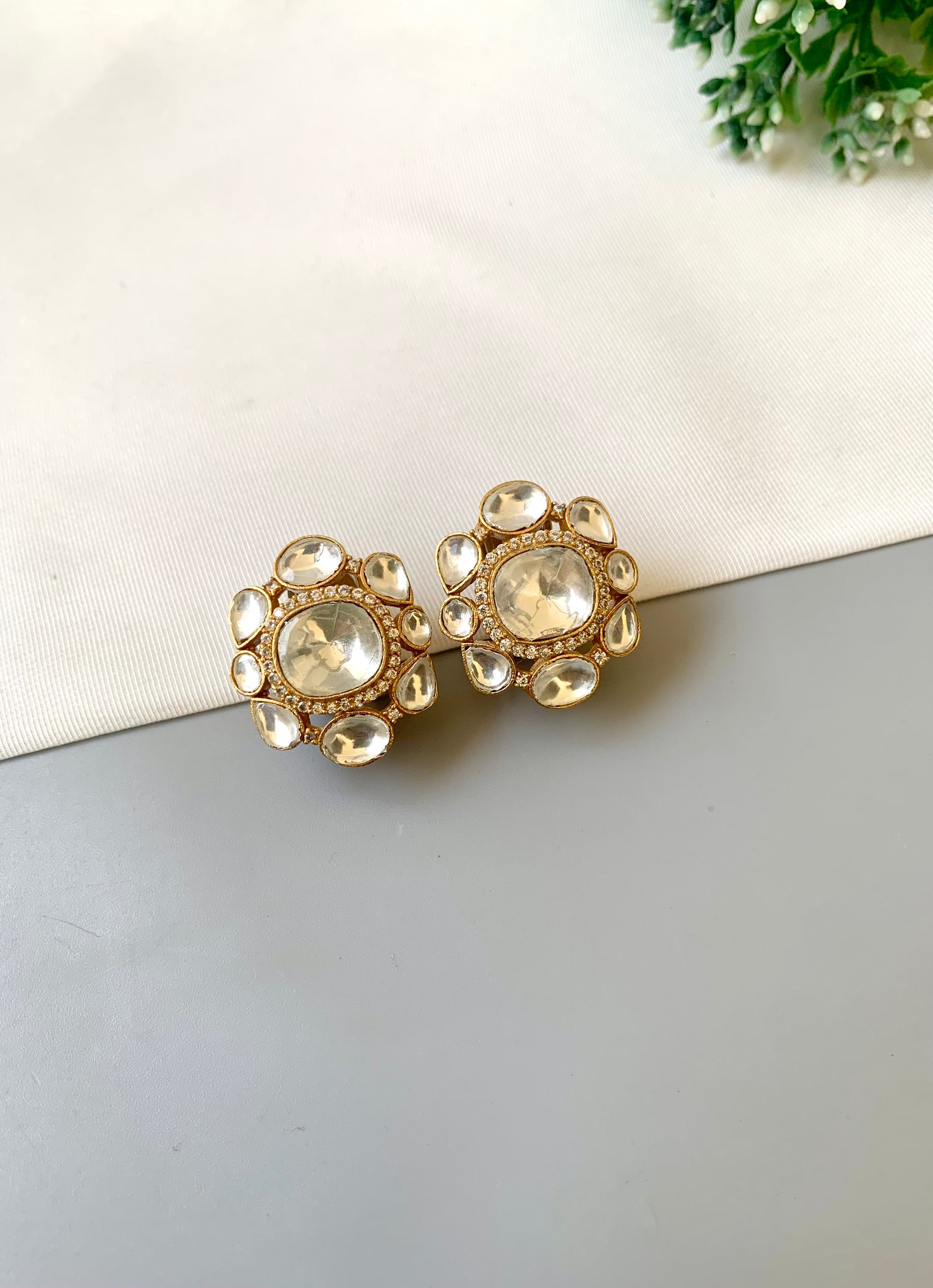 Hand crafted 22kt gold plated studs with American diamonds and moissanite kundan by Zamal
