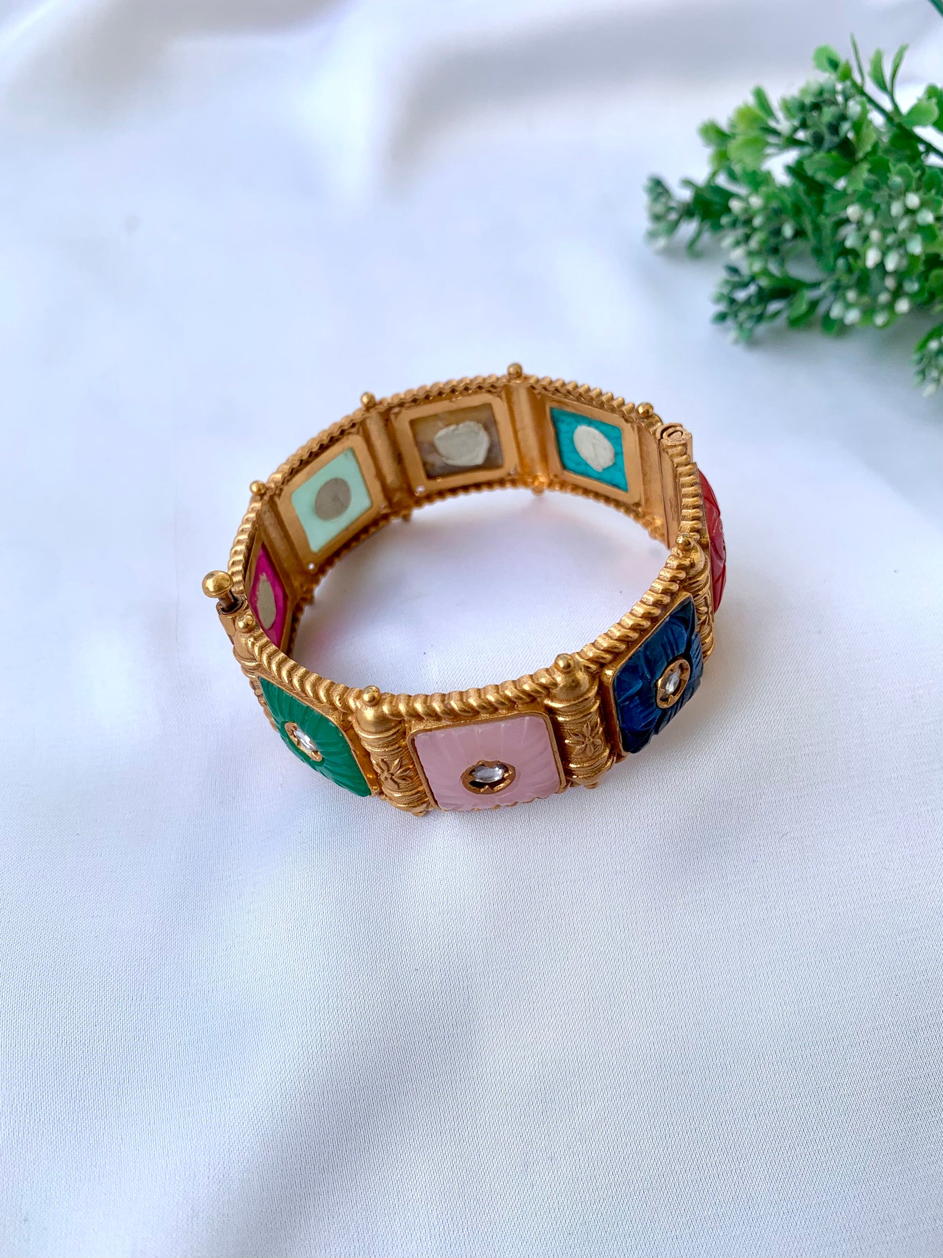 Handcrafted Arzella Bangle in 22kt gold plating with Polki Kundan and hand-carved Sapphire, Ruby, Emerald & Onyx stones