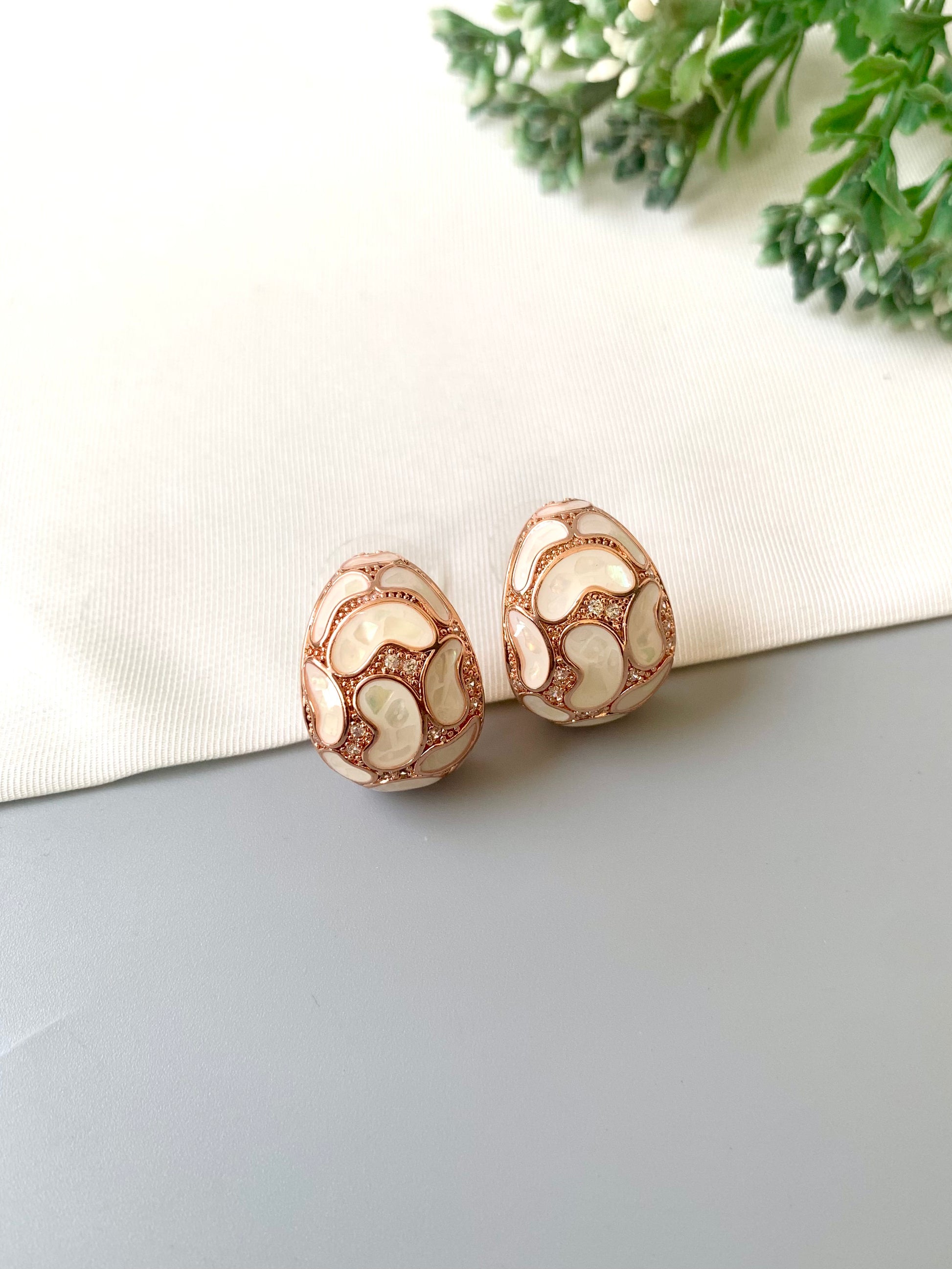 Handcrafted Auralie Studs in 22kt rose gold plating with real Mother of Pearl and American Diamonds by Zamal Jewels.