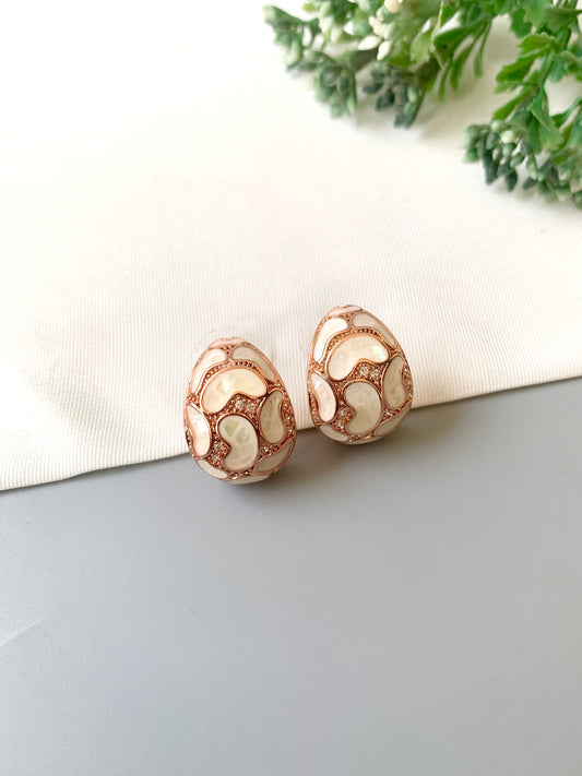 Handcrafted Auralie Studs in 22kt rose gold plating with real Mother of Pearl and American Diamonds by Zamal Jewels.