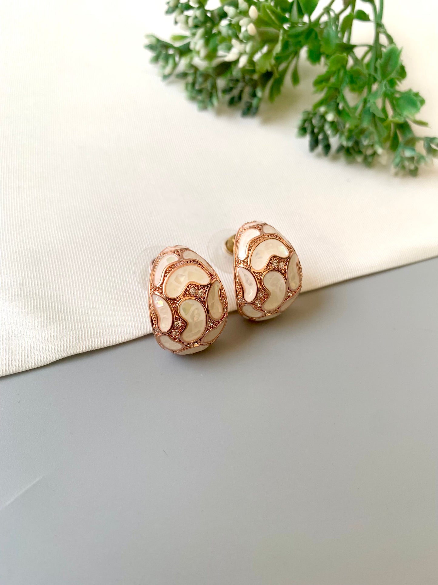 Handcrafted Auralie Studs in 22kt rose gold plating with real Mother of Pearl and American Diamonds by Zamal Jewels.