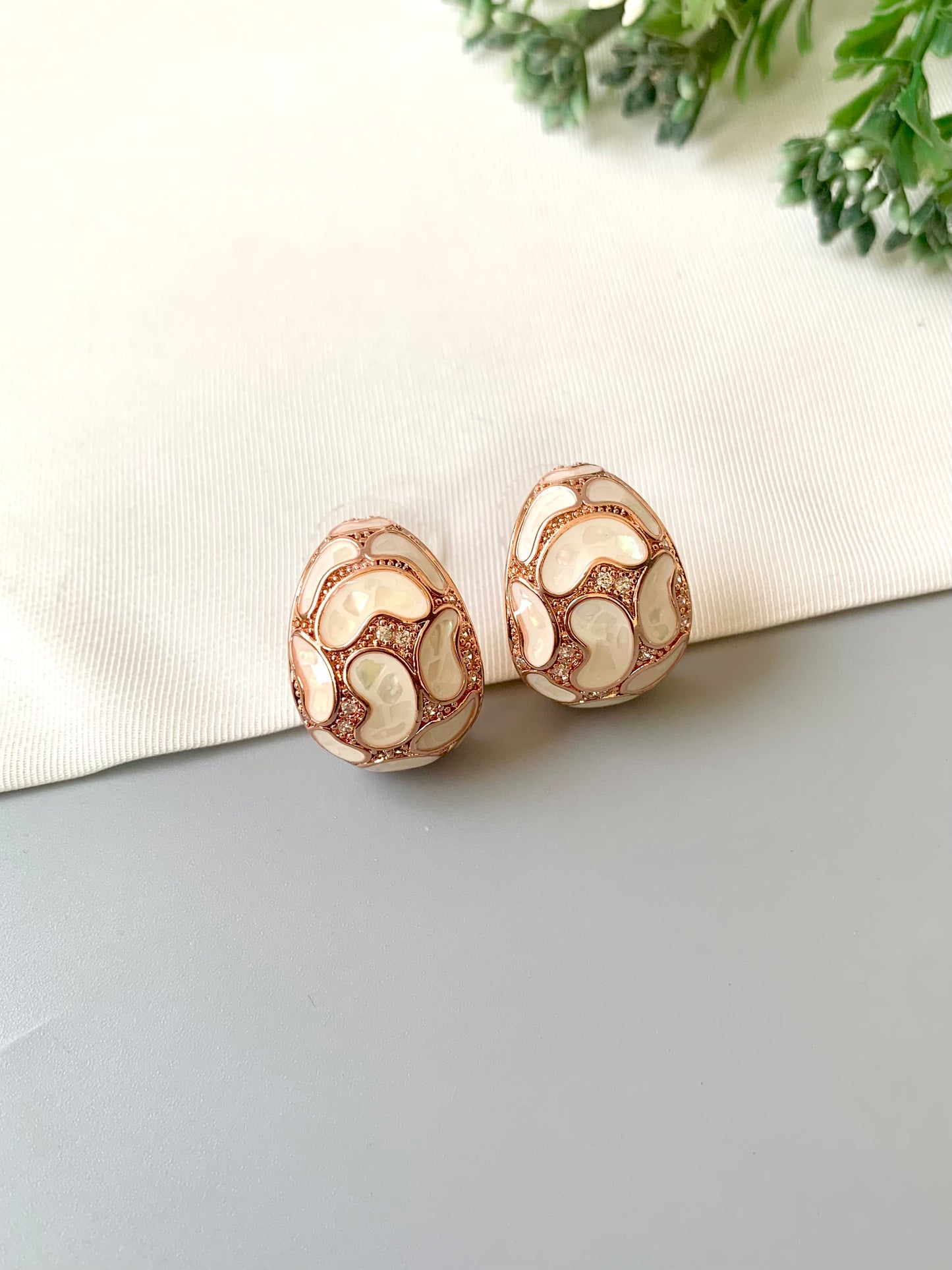 Handcrafted Auralie Studs in 22kt rose gold plating with real Mother of Pearl and American Diamonds by Zamal Jewels.