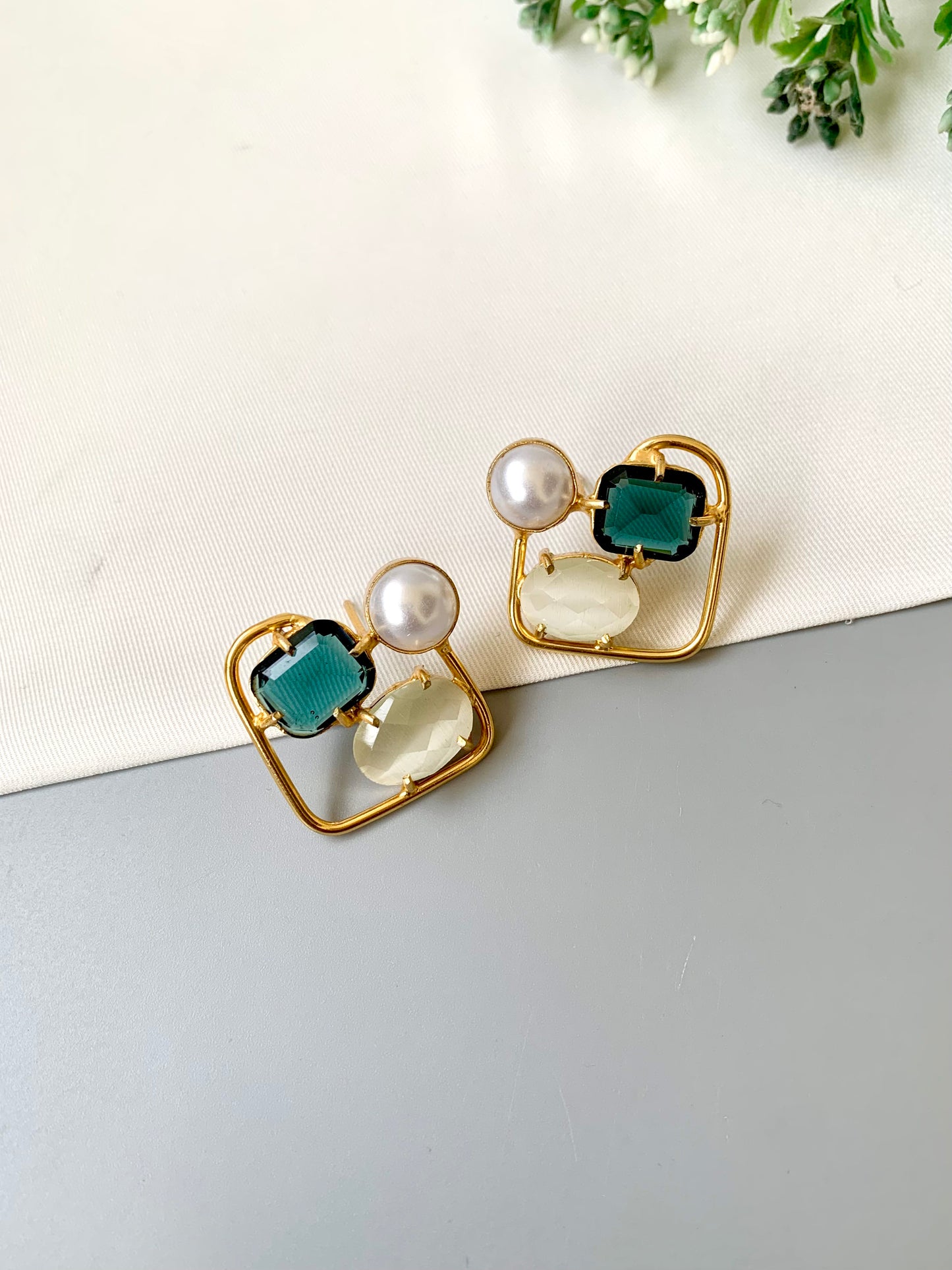 Handcrafted Aureva Studs in Sapphire Ivory with pearl and natural gemstones in 22kt gold plating — by Zamal Jewels.