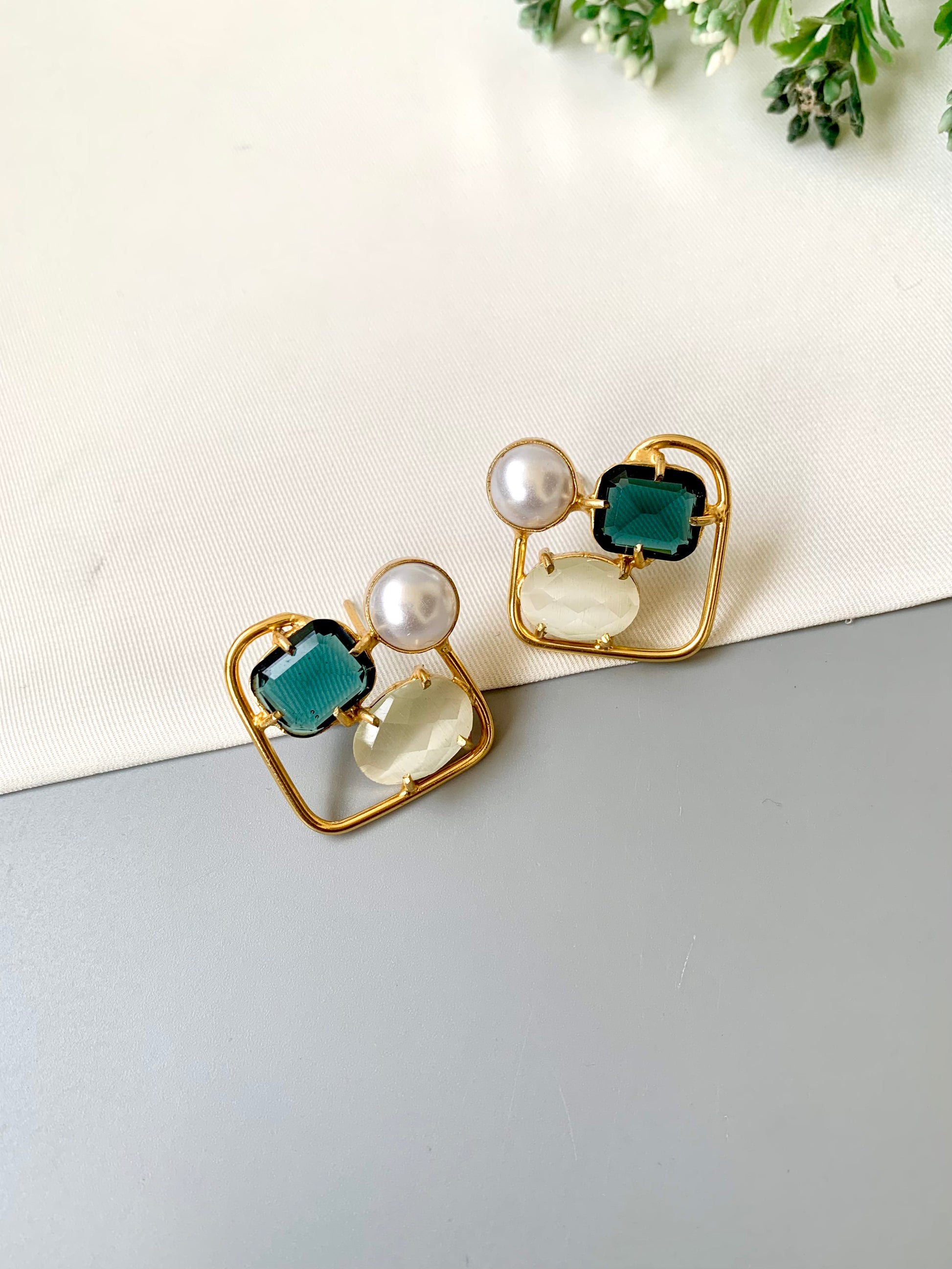 Handcrafted Aureva Studs in Sapphire Ivory with pearl and natural gemstones in 22kt gold plating — by Zamal Jewels.