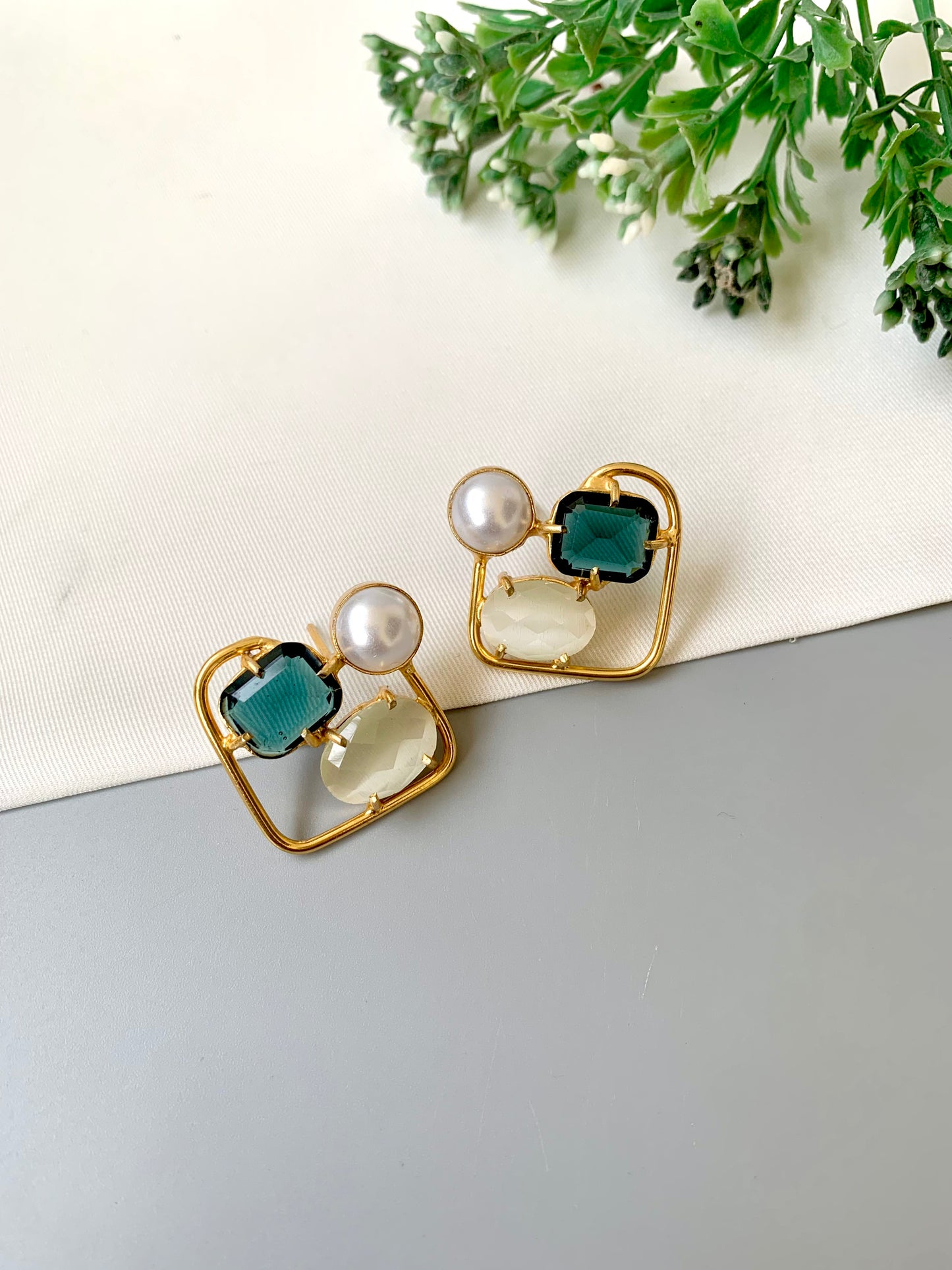 Handcrafted Aureva Studs in Sapphire Ivory with pearl and natural gemstones in 22kt gold plating — by Zamal Jewels.