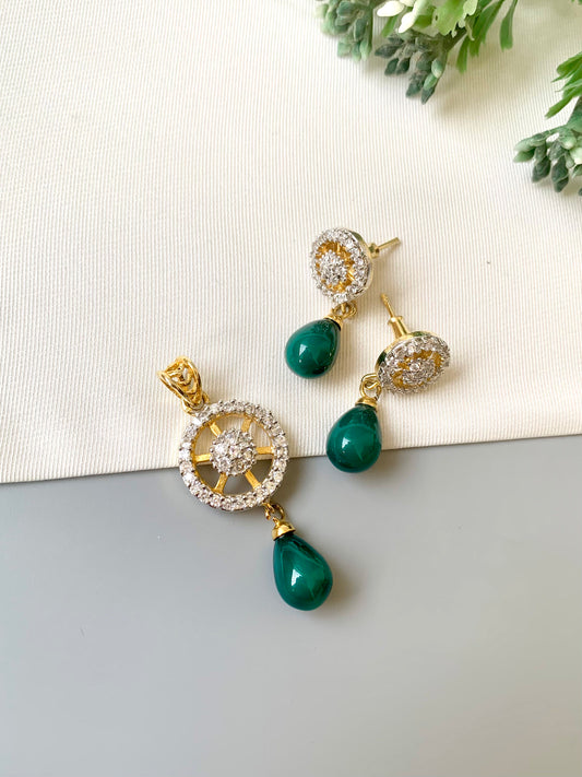 Handcrafted Aveline Pendant Set in 22kt gold plating with high-quality American Diamonds and Semi-Precious Emerald teardrop stones by Zamal Jewels.