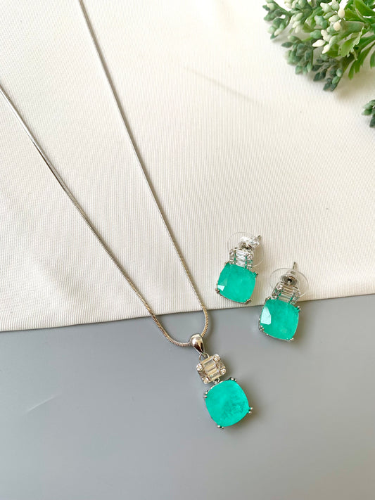 Handcrafted Celise Pendant Set in rhodium plating with Semi-Precious Mint Onyx and American Diamonds — includes chain, pendant, and studs by Zamal Jewels.