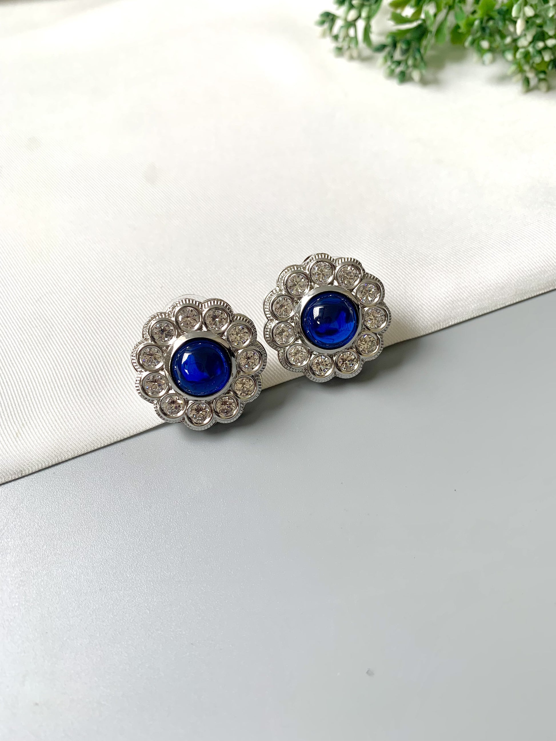 Handcrafted rhodium-plated Cyanora Studs with semi-precious sapphire center and American Diamonds – Zamal Jewels