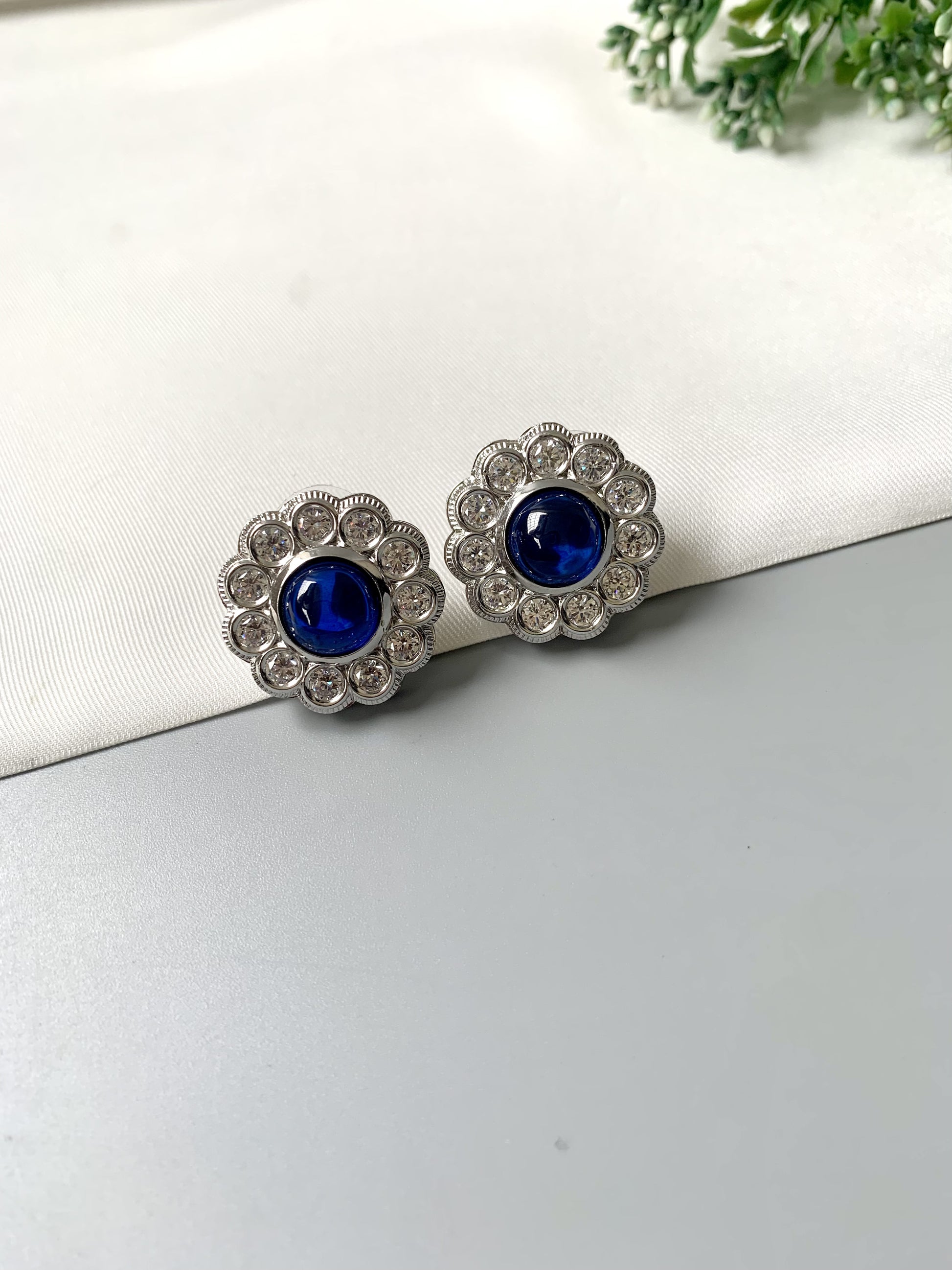 Handcrafted rhodium-plated Cyanora Studs with semi-precious sapphire center and American Diamonds – Zamal Jewels