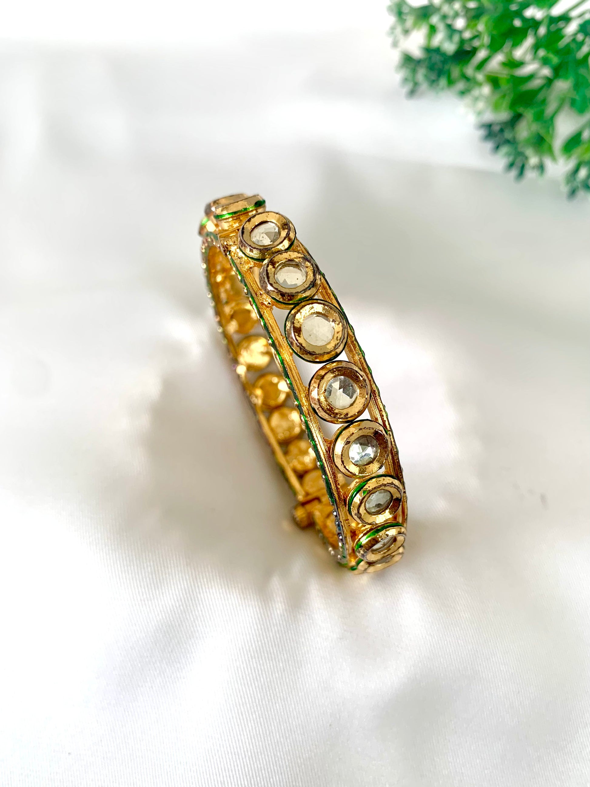 Handcrafted openable gold bangle with Kundan stones and hand-painted Meena work by Zamal Jewels