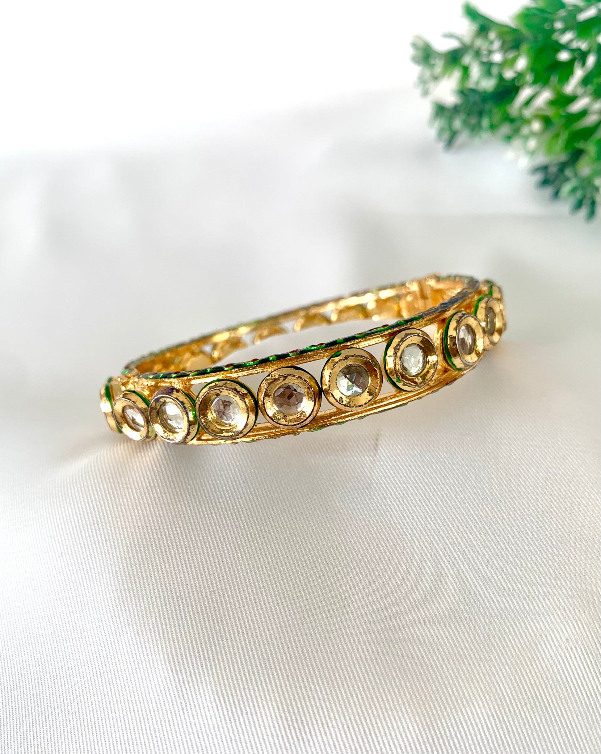 Handcrafted openable gold bangle with Kundan stones and hand-painted Meena work by Zamal Jewels