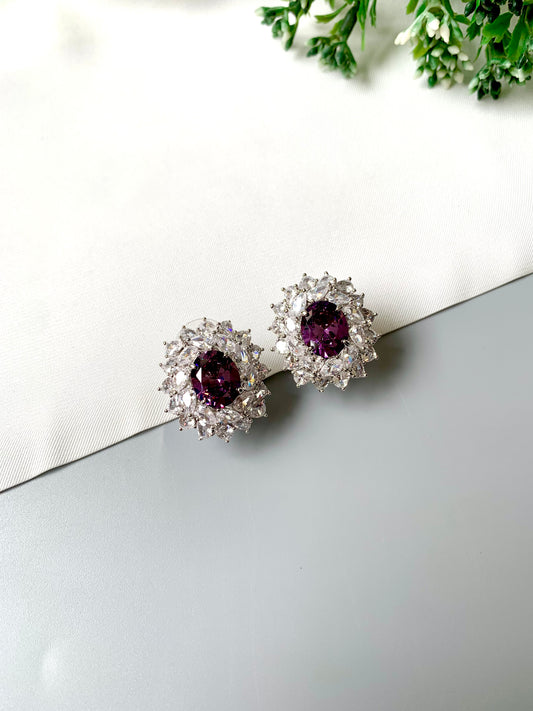 Hand crafted rhodium plated studs in platinum finish featuring semi-precious amethyst and American Diamonds by Zamal Jewels