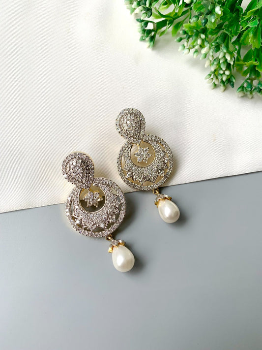 Handcrafted pearl drop earrings with American Diamonds in 22kt gold plating by Zamal Jewels