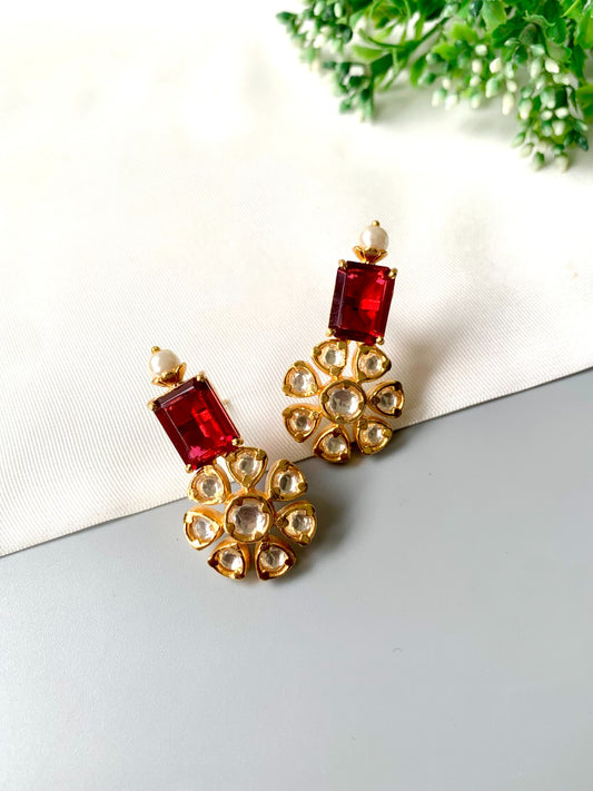 Handcrafted ruby earrings with Polki Kundan and semi-precious pearls in 22kt gold plating by Zamal Jewels.