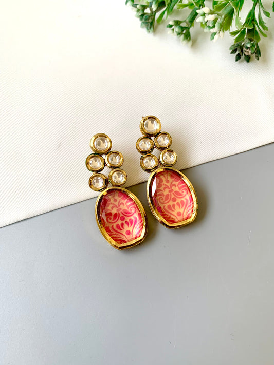 Handcrafted Mehira Earrings in pink with Polki Bikaneri Kundan and hand-painted Meena — 22kt gold plated by Zamal Jewels.