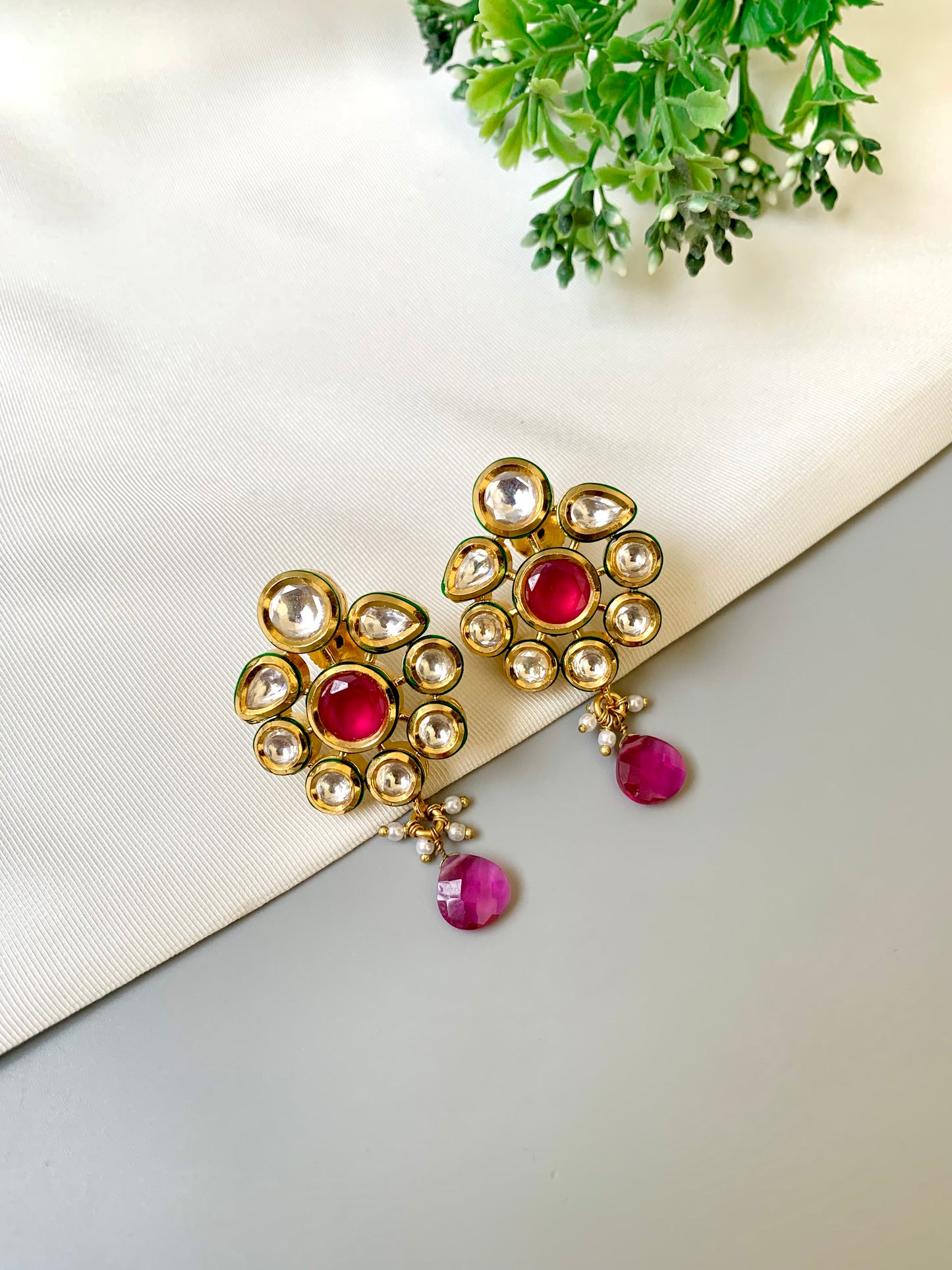 Handcrafted Mehira Ruby Kundan Earrings in 22kt gold plating with Bikanairi Kundan and semi-precious ruby by Zamal Jewels.