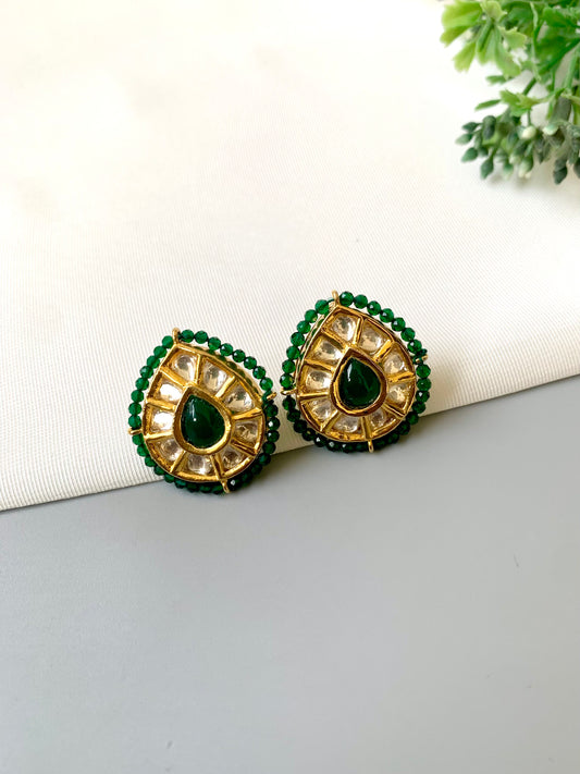 Handcrafted Mehreen Emerald Studs in 22kt gold plating with Polki Kundan, hand-painted Meena work, semi-precious Emerald stones, and pearls by Zamal Jewels.