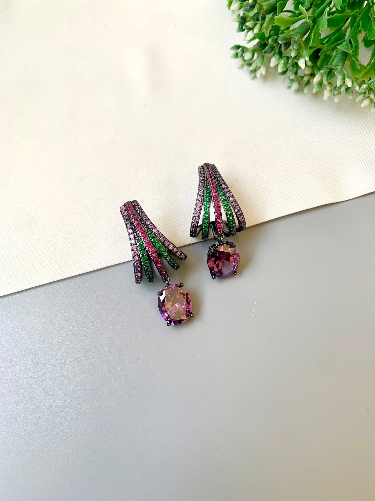 Handcrafted rhodium plated oxidized earrings with American diamonds and ruby emerald amethyst stones