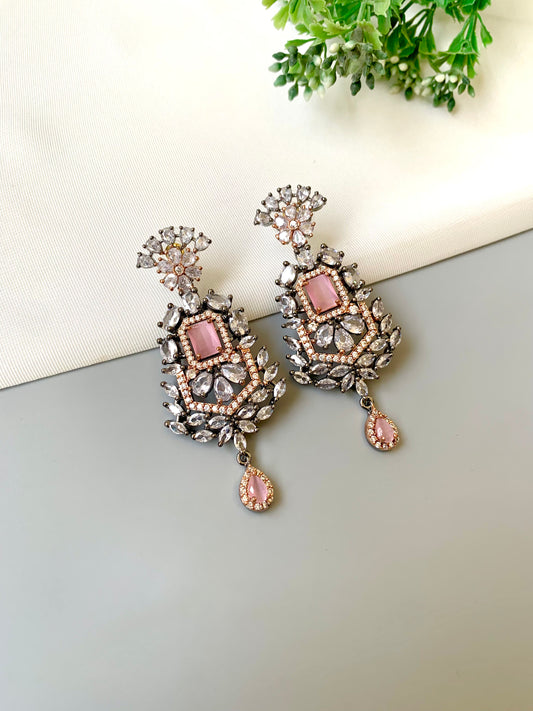 Handcrafted Nerina Rose Onyx Earrings in oxidized rose gold plating with American Diamonds and semi-precious onyx by Zamal Jewels.