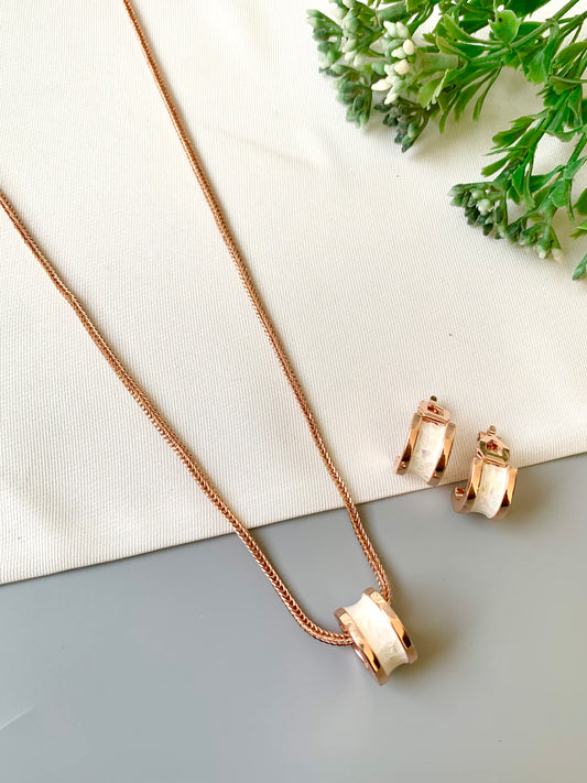 Handcrafted Noira Pendant Set in 22kt rose gold plating with real Mother of Pearl — by Zamal Jewels.