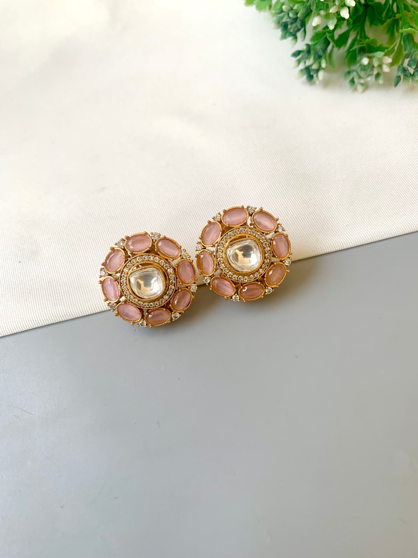 Hand crafted 22kt gold plated studs with American diamonds, moissanite kundan and semi-precious onyx by Zamal