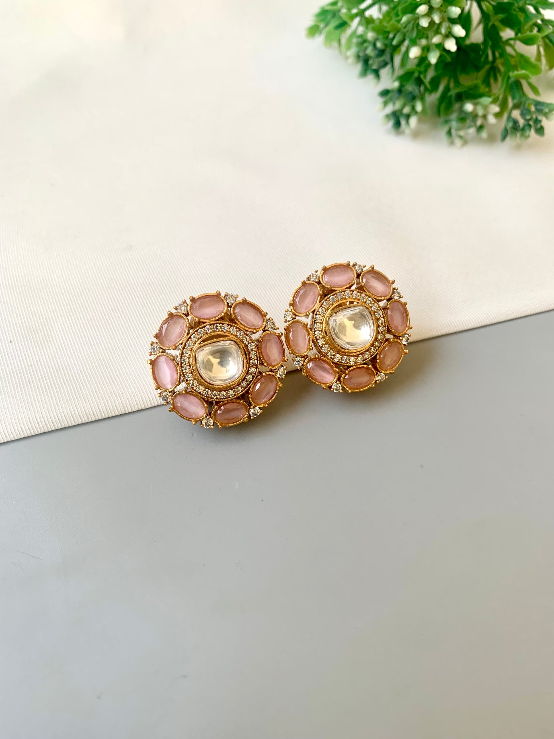 Hand crafted 22kt gold plated studs with American diamonds, moissanite kundan and semi-precious onyx by Zamal