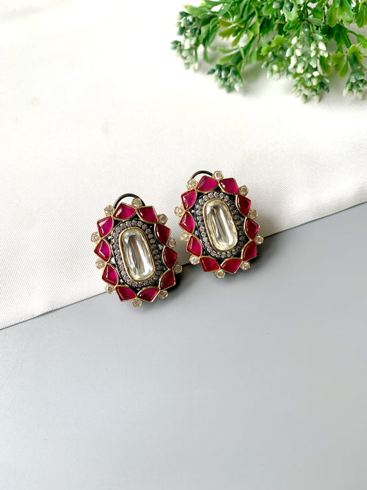 Handcrafted Ravira Ruby Studs in oxidized rhodium plating with Polki Kundan centerpiece, ruby petals, and American Diamonds – Zamal Jewels