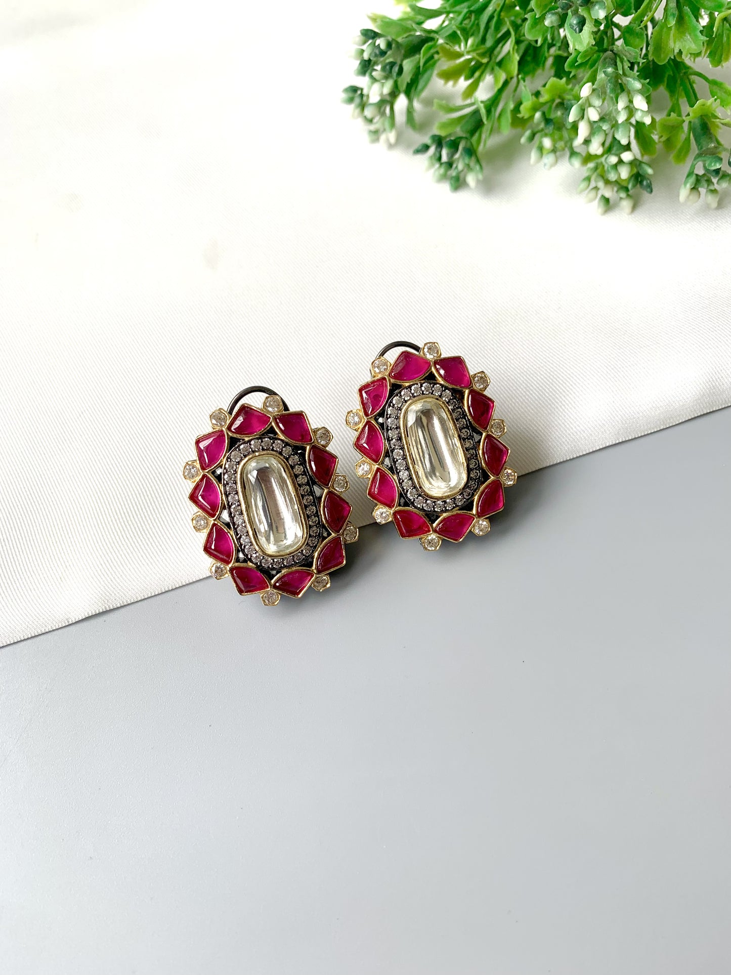 Handcrafted Ravira Ruby Studs in oxidized rhodium plating with Polki Kundan centerpiece, ruby petals, and American Diamonds – Zamal Jewels