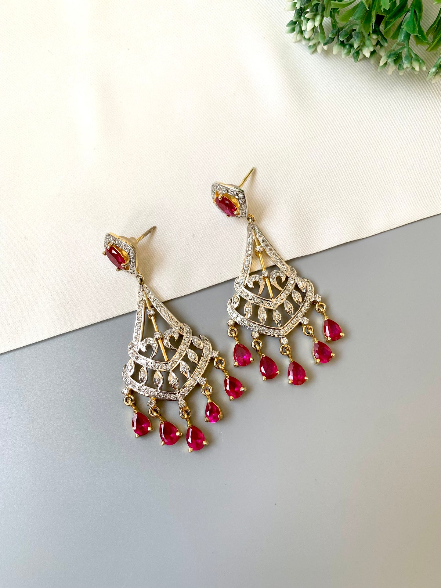 Hand crafted ruby chandelier dangler earrings with 22kt gold plating and American diamonds