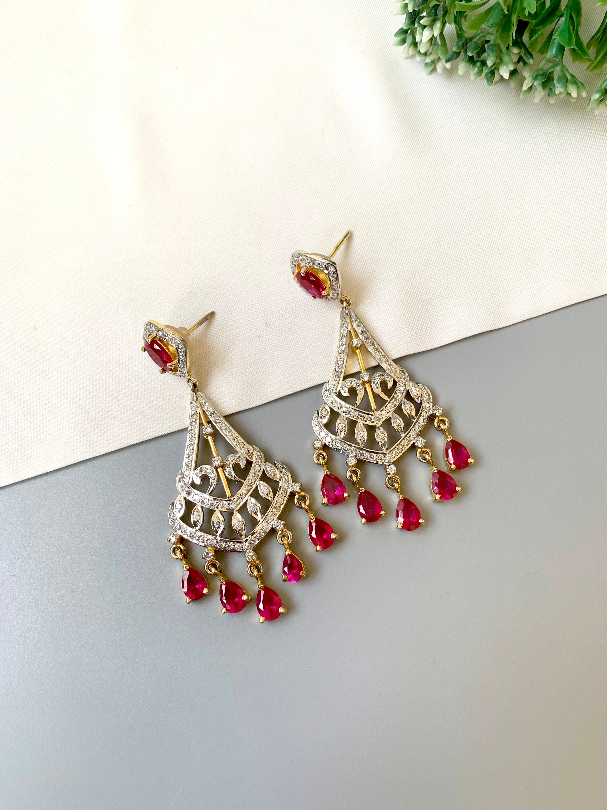 Hand crafted ruby chandelier dangler earrings with 22kt gold plating and American diamonds