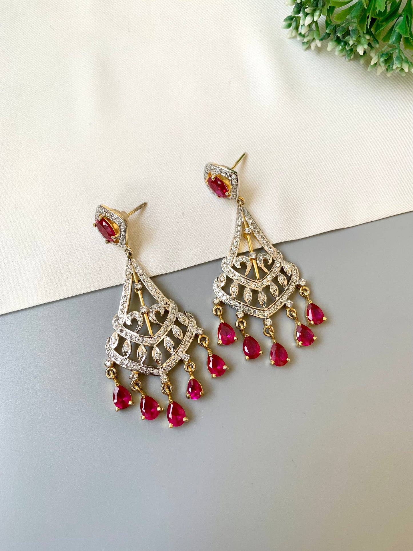 Hand crafted ruby chandelier dangler earrings with 22kt gold plating and American diamonds