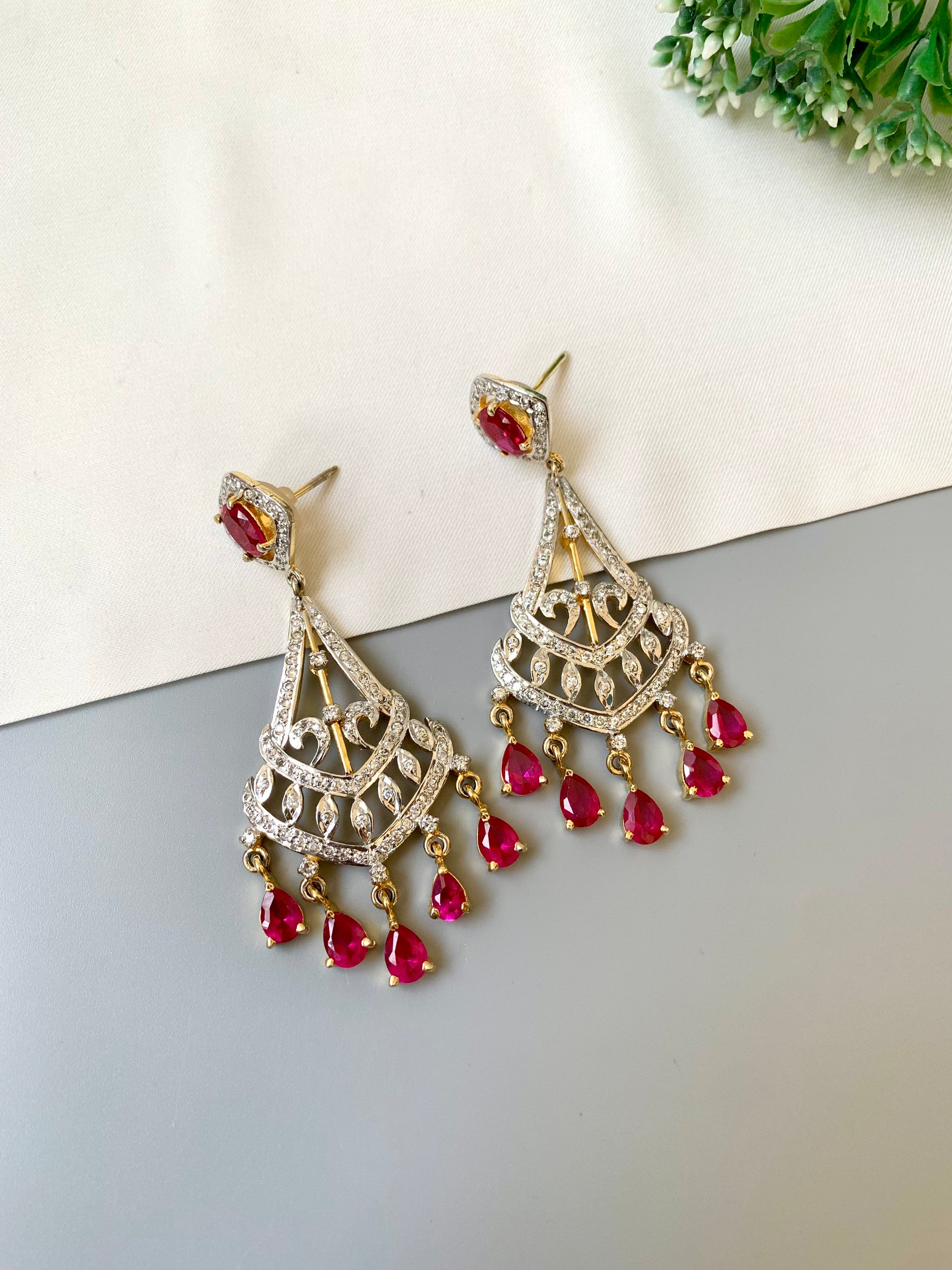 Hand crafted ruby chandelier dangler earrings with 22kt gold plating and American diamonds