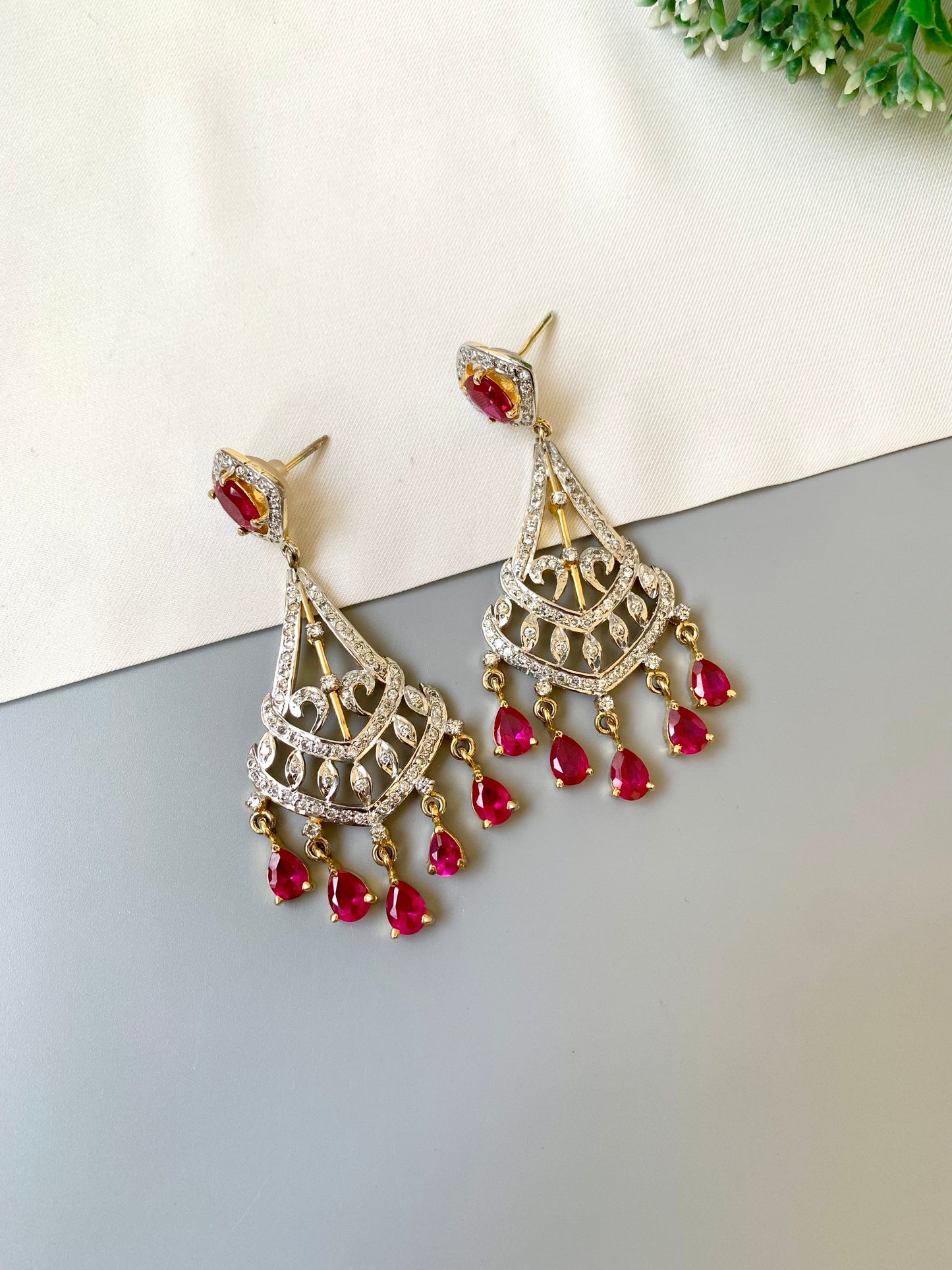Hand crafted ruby chandelier dangler earrings with 22kt gold plating and American diamonds