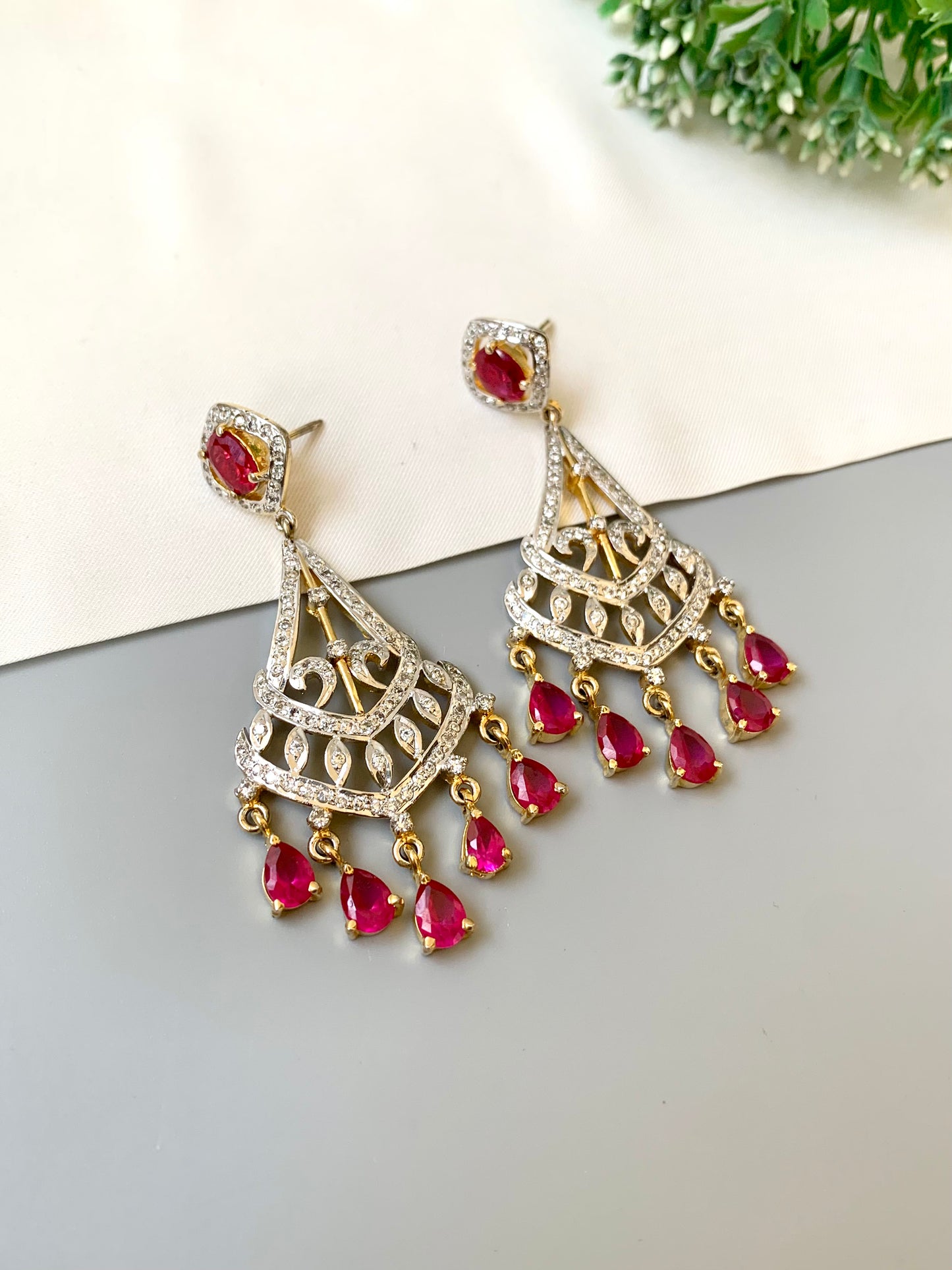 Hand crafted ruby chandelier dangler earrings with 22kt gold plating and American diamonds