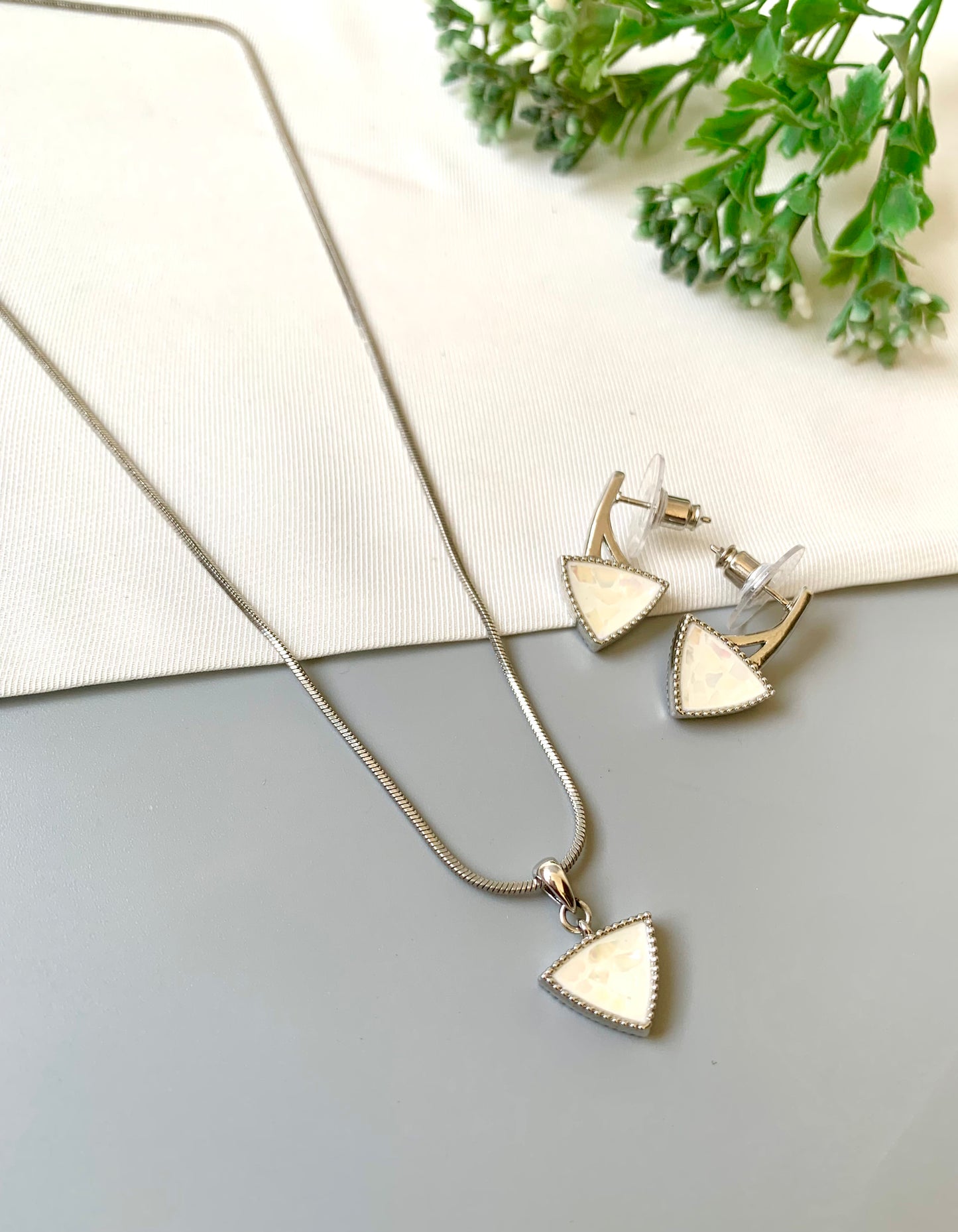 Handcrafted Seren Pendant Set in rhodium plating with real Mother of Pearl — includes chain, pendant, and earrings by Zamal Jewels.