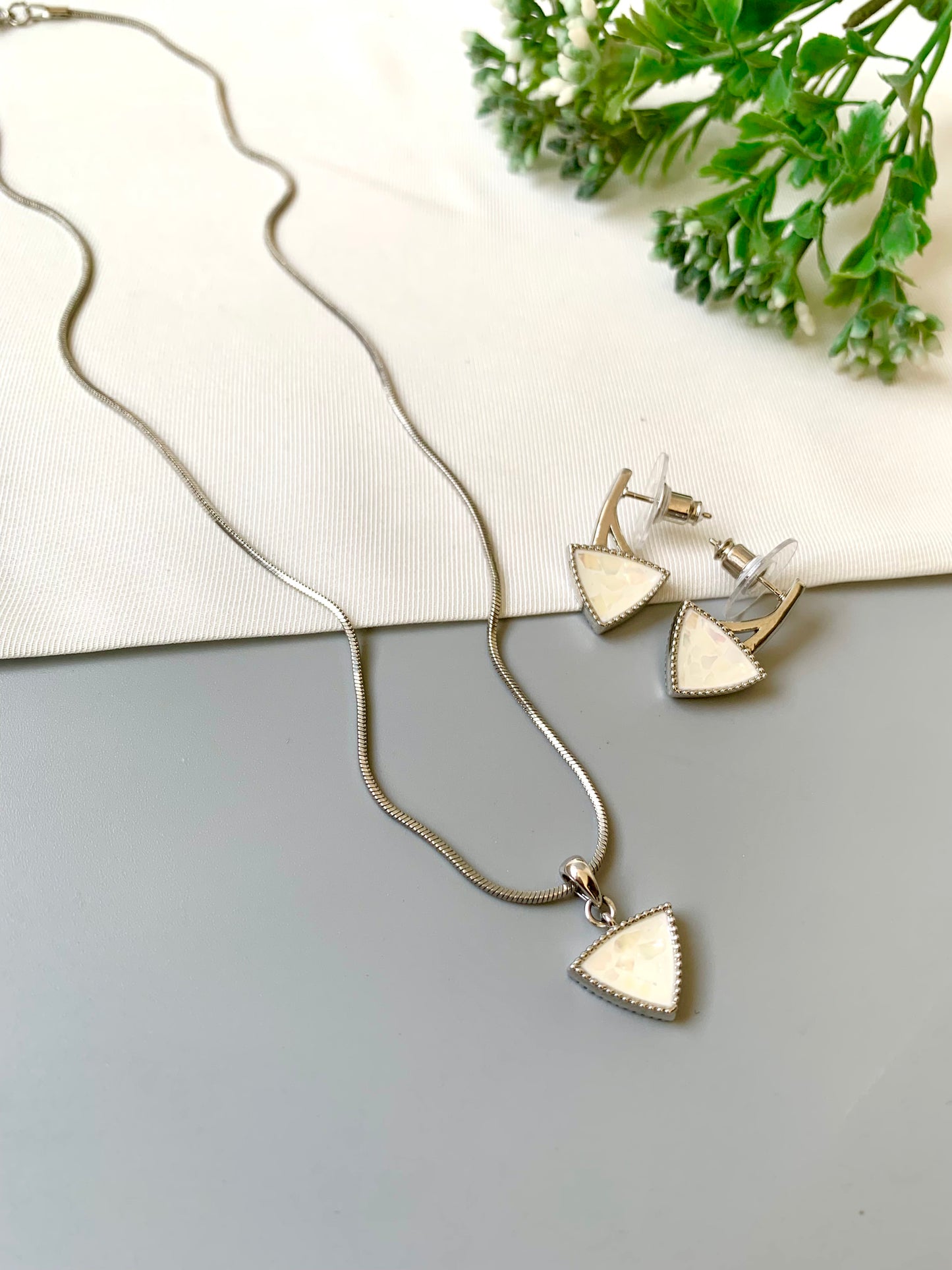 Handcrafted Seren Pendant Set in rhodium plating with real Mother of Pearl — includes chain, pendant, and earrings by Zamal Jewels.