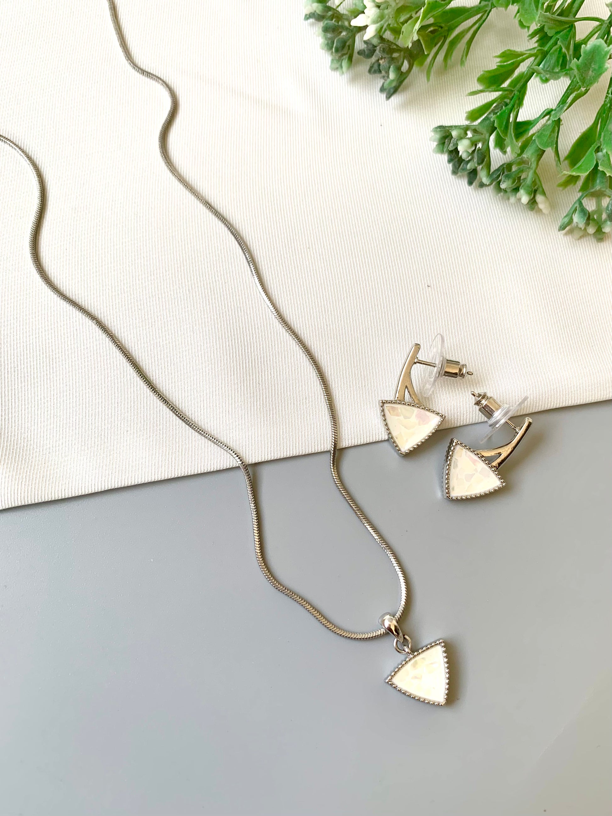 Handcrafted Seren Pendant Set in rhodium plating with real Mother of Pearl — includes chain, pendant, and earrings by Zamal Jewels.