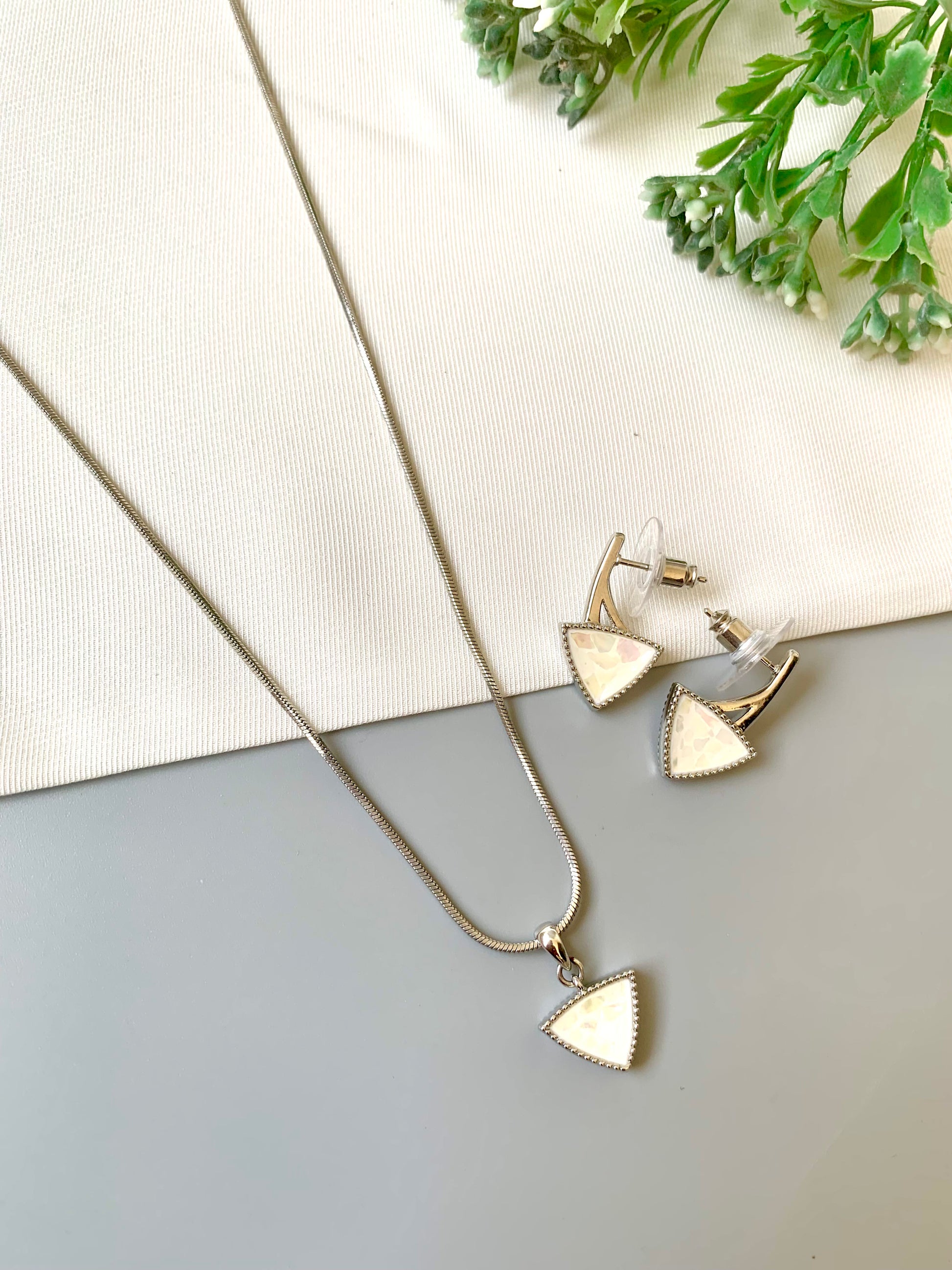 Handcrafted Seren Pendant Set in rhodium plating with real Mother of Pearl — includes chain, pendant, and earrings by Zamal Jewels.