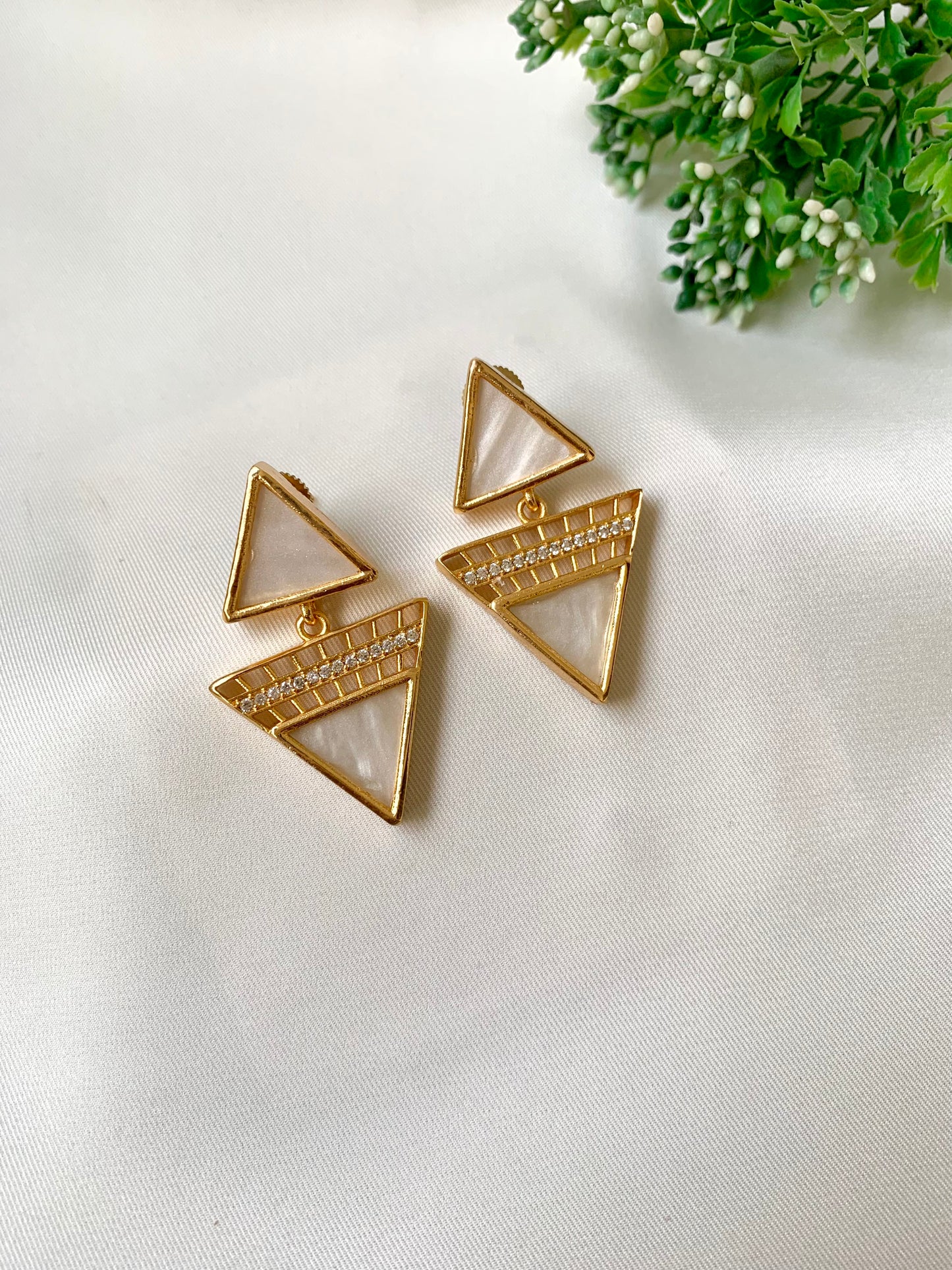 White mother of pearl earrings with American diamonds in 22kt gold plating