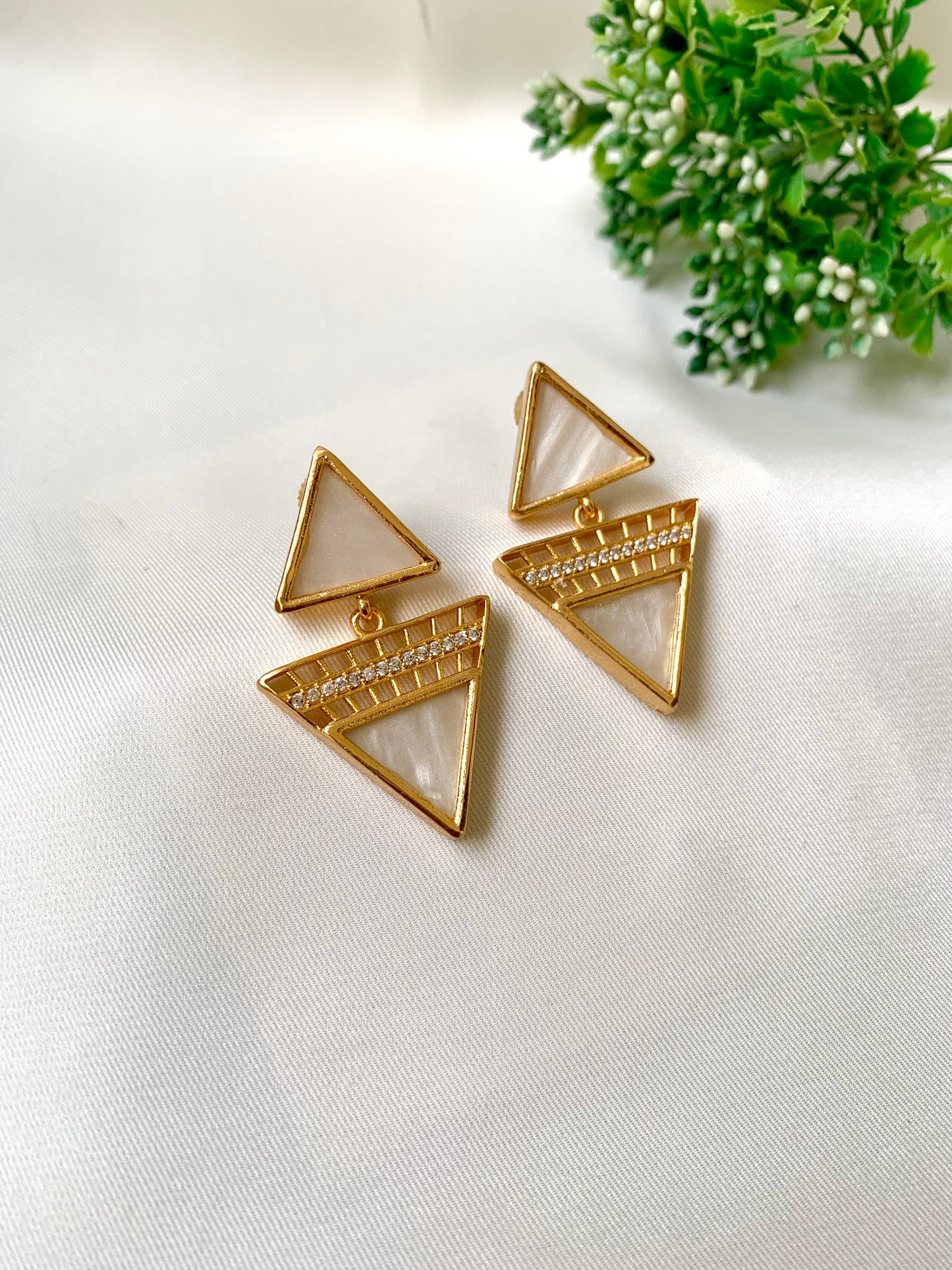 White mother of pearl earrings with American diamonds in 22kt gold plating