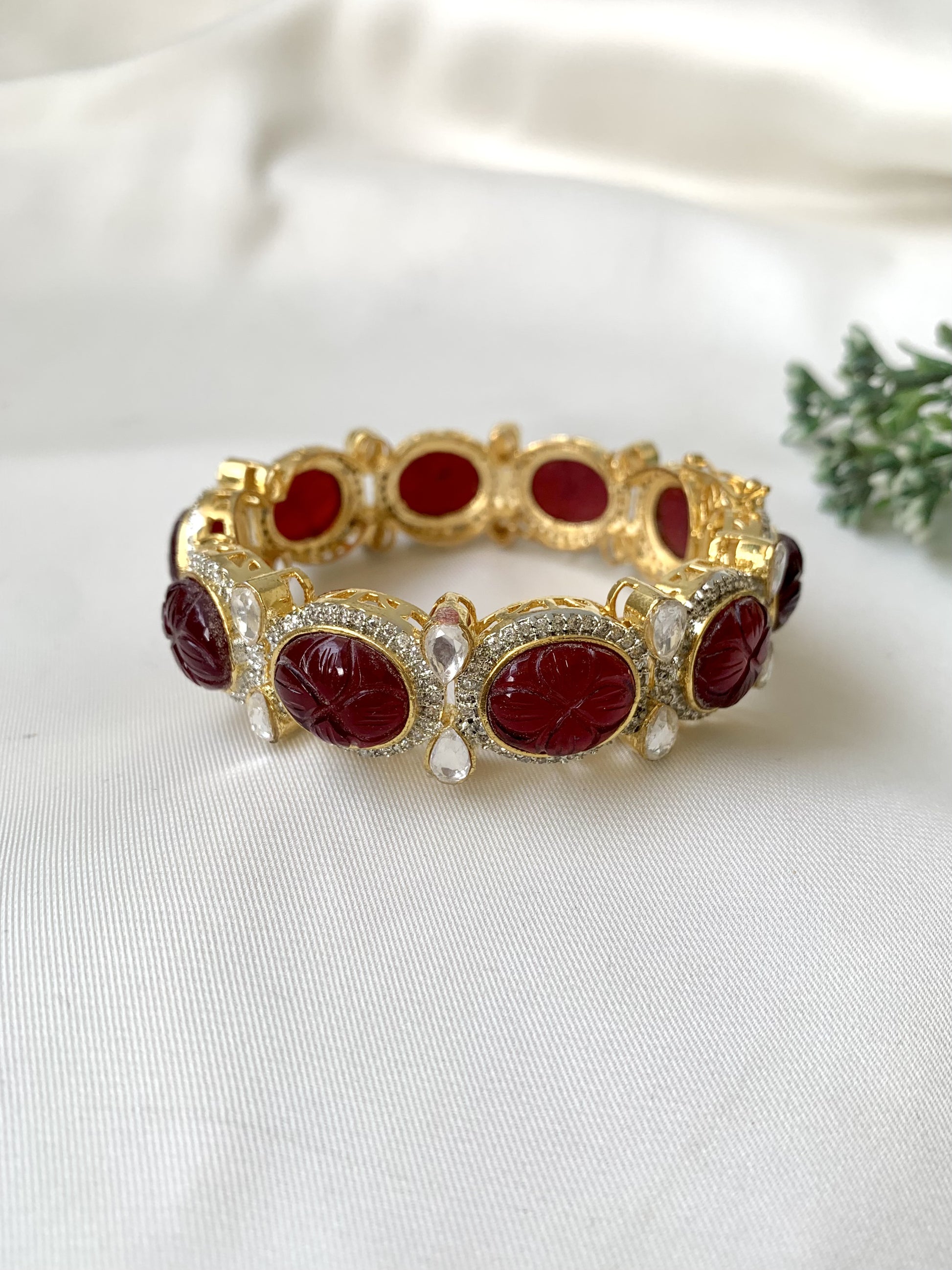 Handcrafted Zahra Bangle in 22kt gold plating with Polki Kundan, Semi-Precious Garnet, and American Diamonds — openable screw bangle by Zamal Jewels.