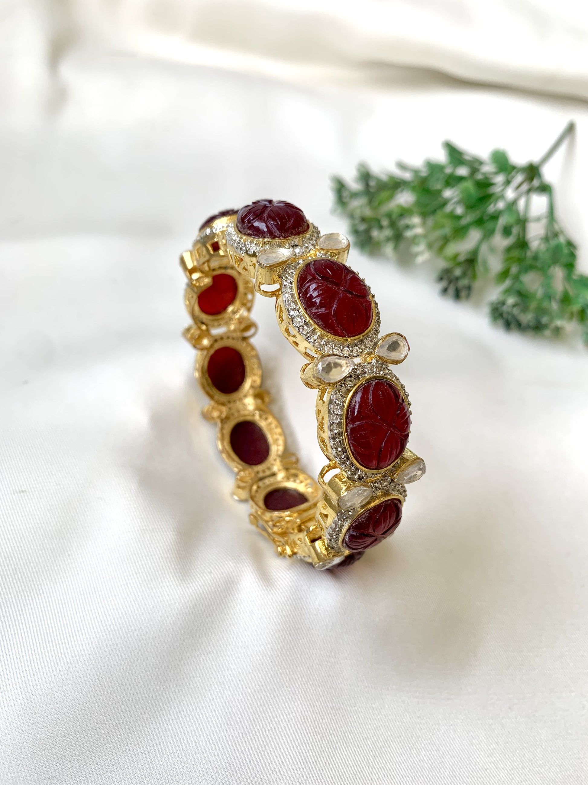 Handcrafted Zahra Bangle in 22kt gold plating with Polki Kundan, Semi-Precious Garnet, and American Diamonds — openable screw bangle by Zamal Jewels.