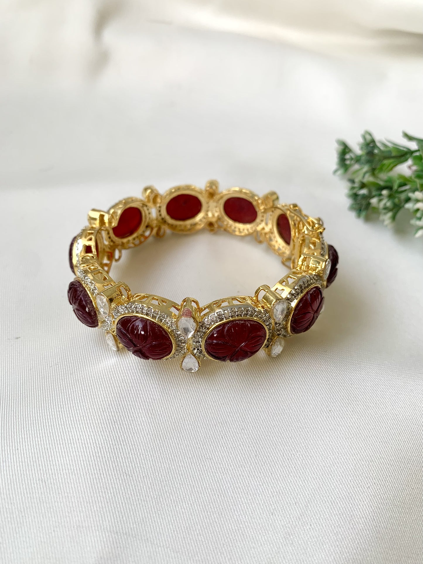 Handcrafted Zahra Bangle in 22kt gold plating with Polki Kundan, Semi-Precious Garnet, and American Diamonds — openable screw bangle by Zamal Jewels.