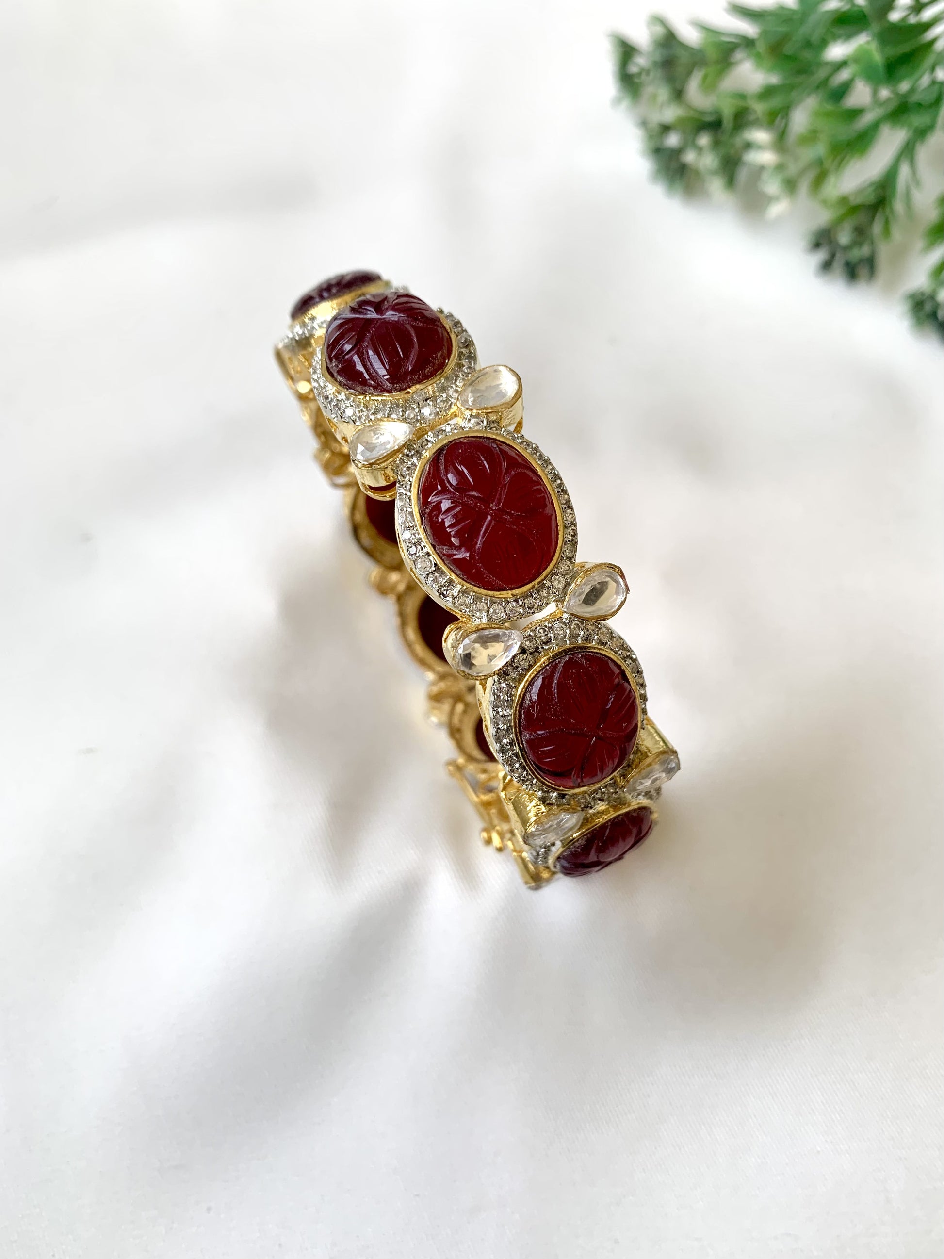 Handcrafted Zahra Bangle in 22kt gold plating with Polki Kundan, Semi-Precious Garnet, and American Diamonds — openable screw bangle by Zamal Jewels.