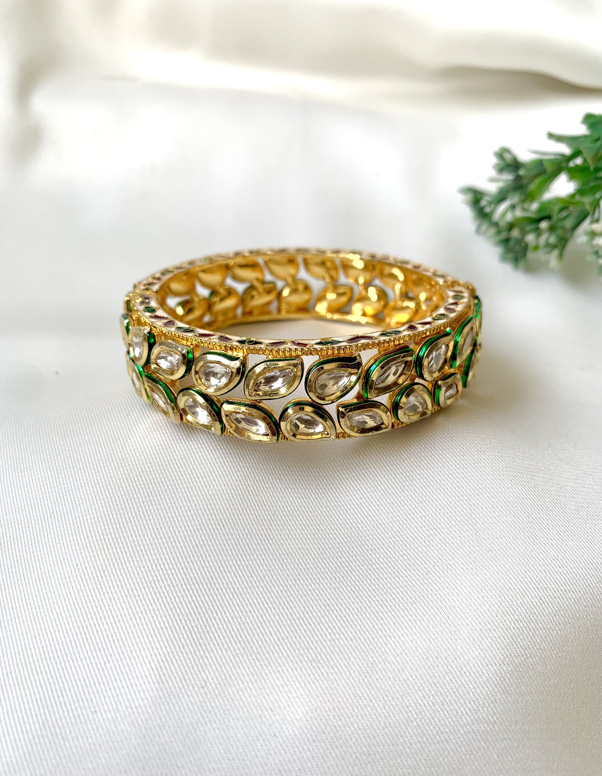 Handcrafted Zareen Bangle in 22kt gold plating with Bikaneri Polki Kundan and hand-painted Meena work — by Zamal Jewels.