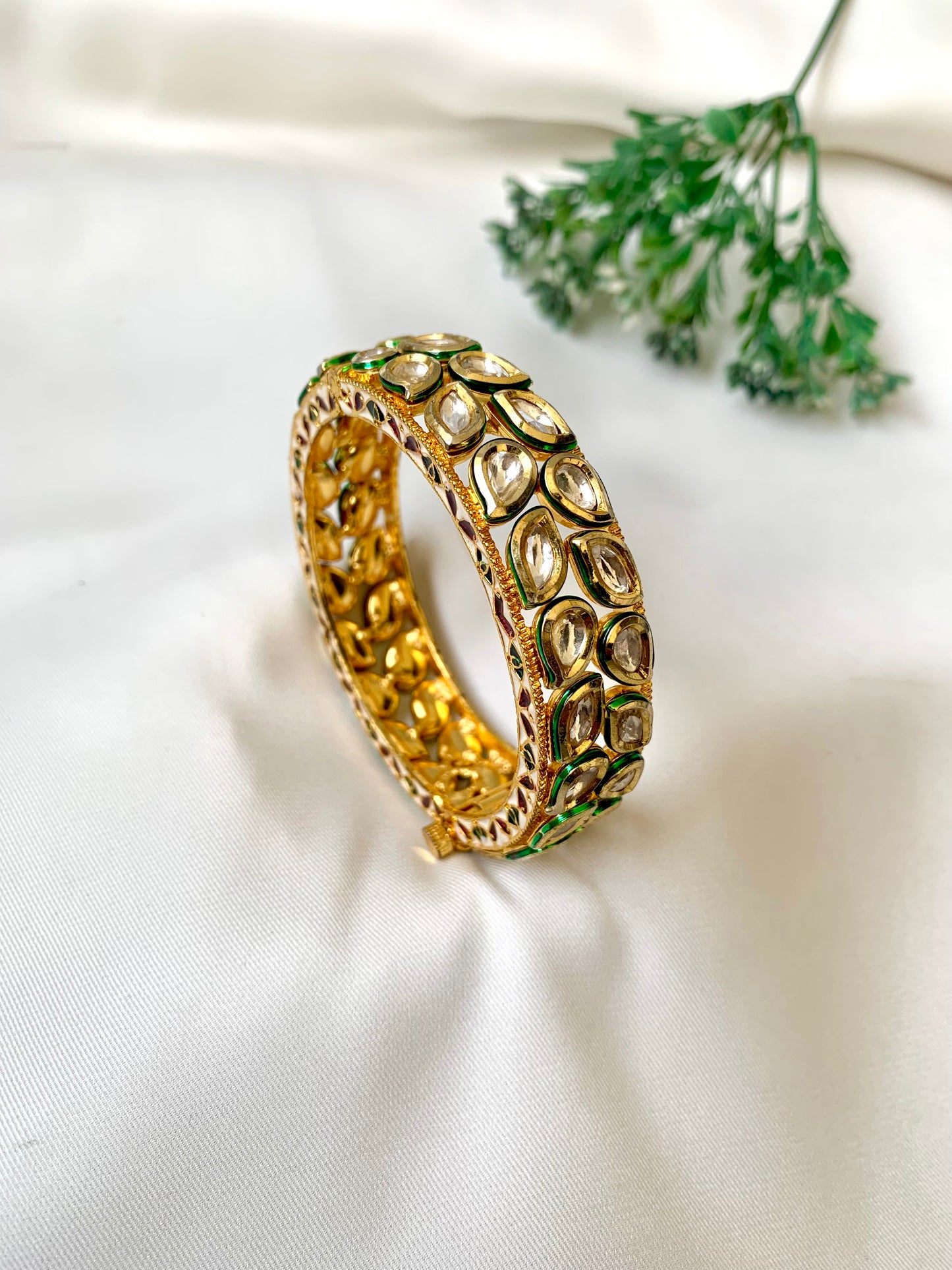 Handcrafted Zareen Bangle in 22kt gold plating with Bikaneri Polki Kundan and hand-painted Meena work — by Zamal Jewels.